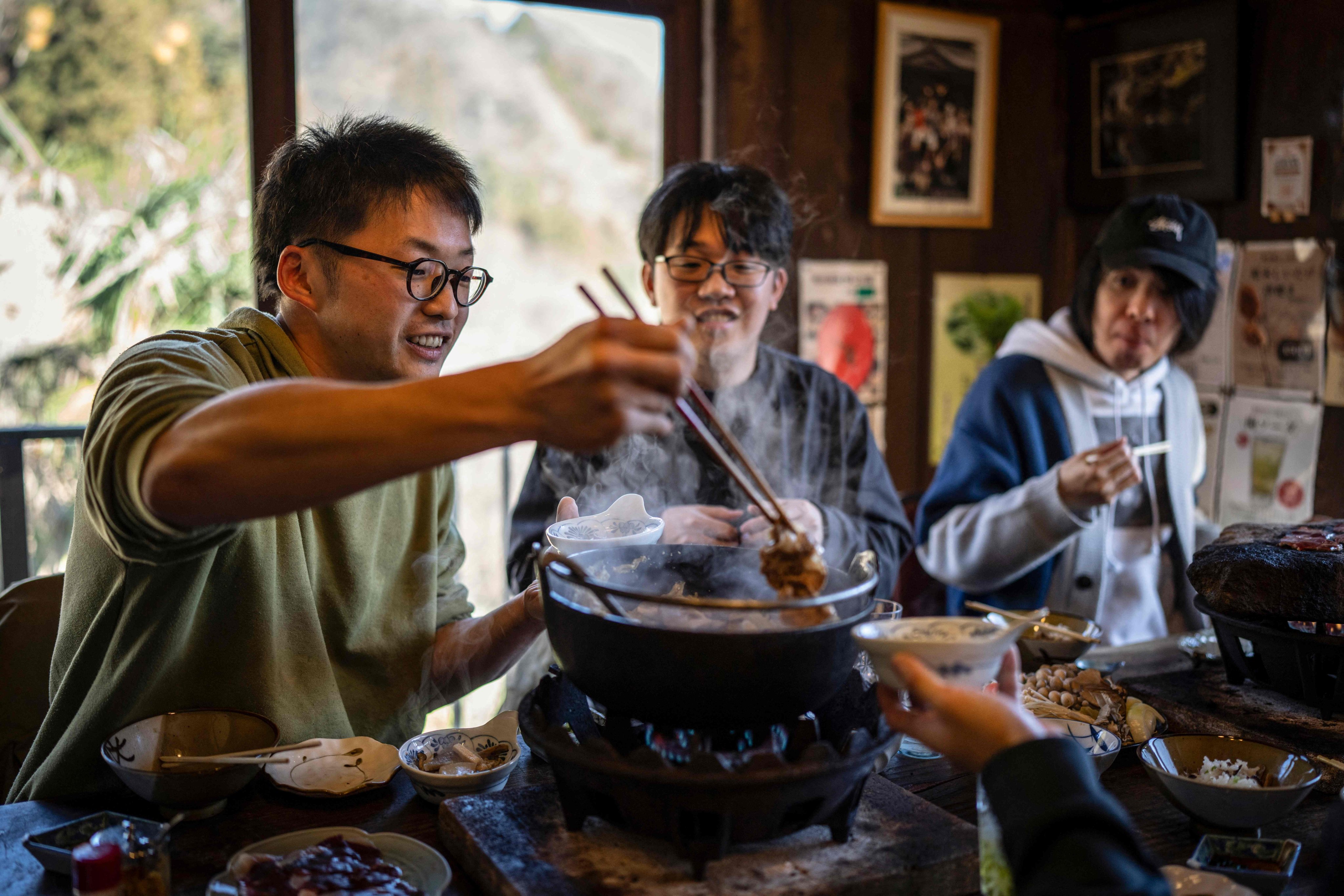 People eat bear meat hot pot at a restaurant in Chichibu, Japan’s Saitama prefecture. Photo: AFP
