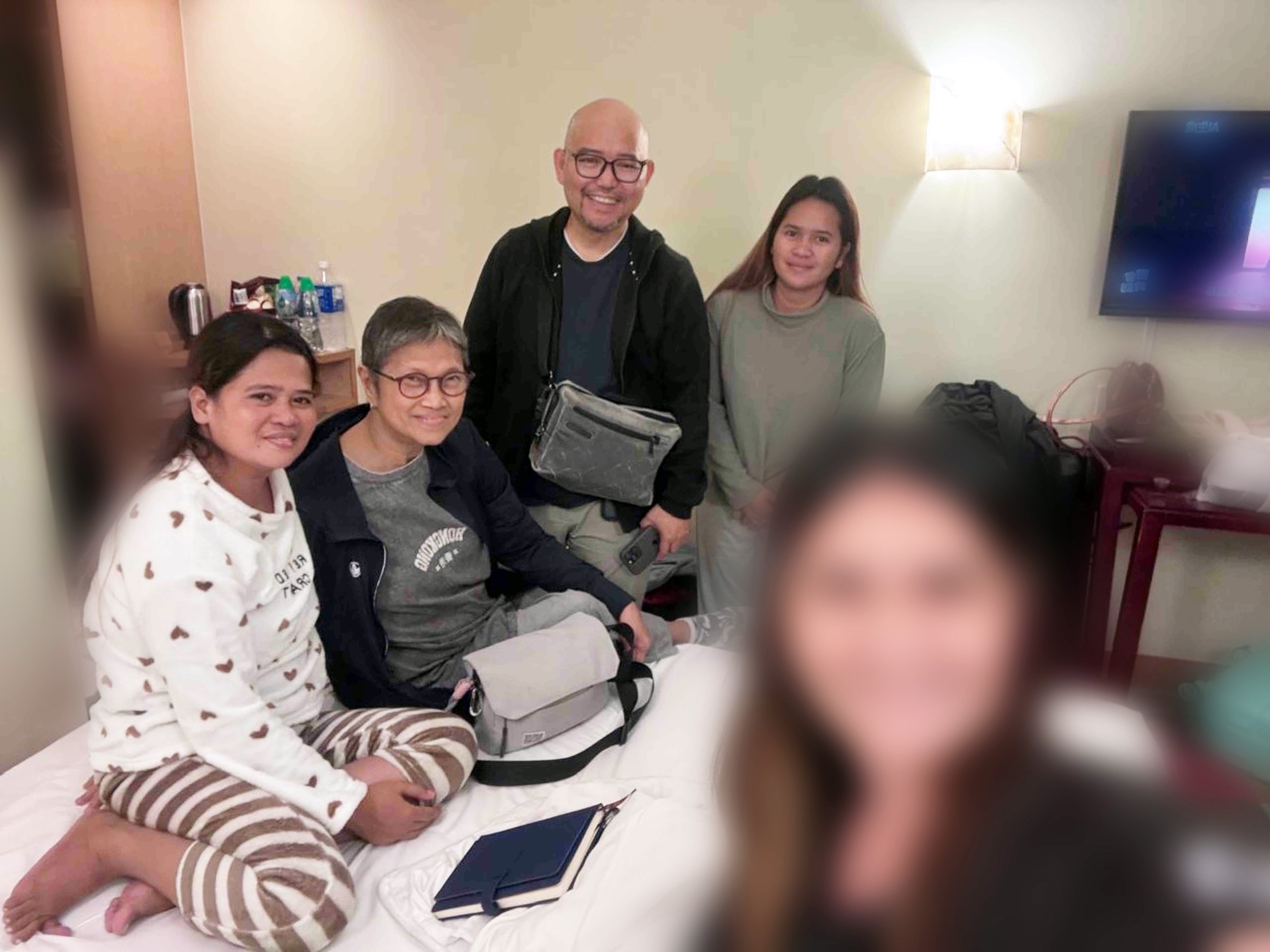 Rhodora Alcaraz (front right) is still covering after last month’s deadly fire in Hong Kong. Photo: Handout