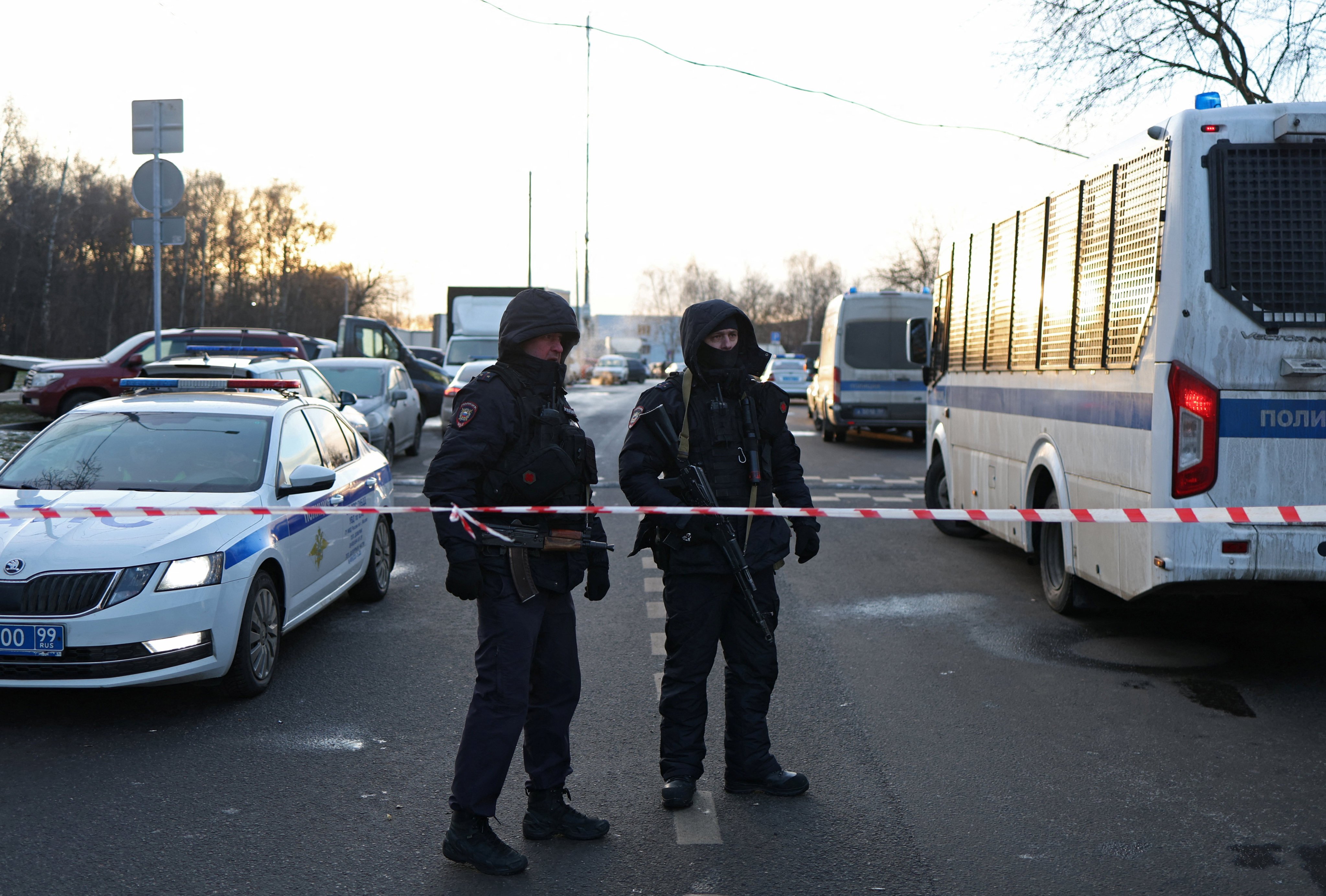 Law enforcement officers block the road near the scene of Wednesday’s deadly explosion. Photo: Reuters