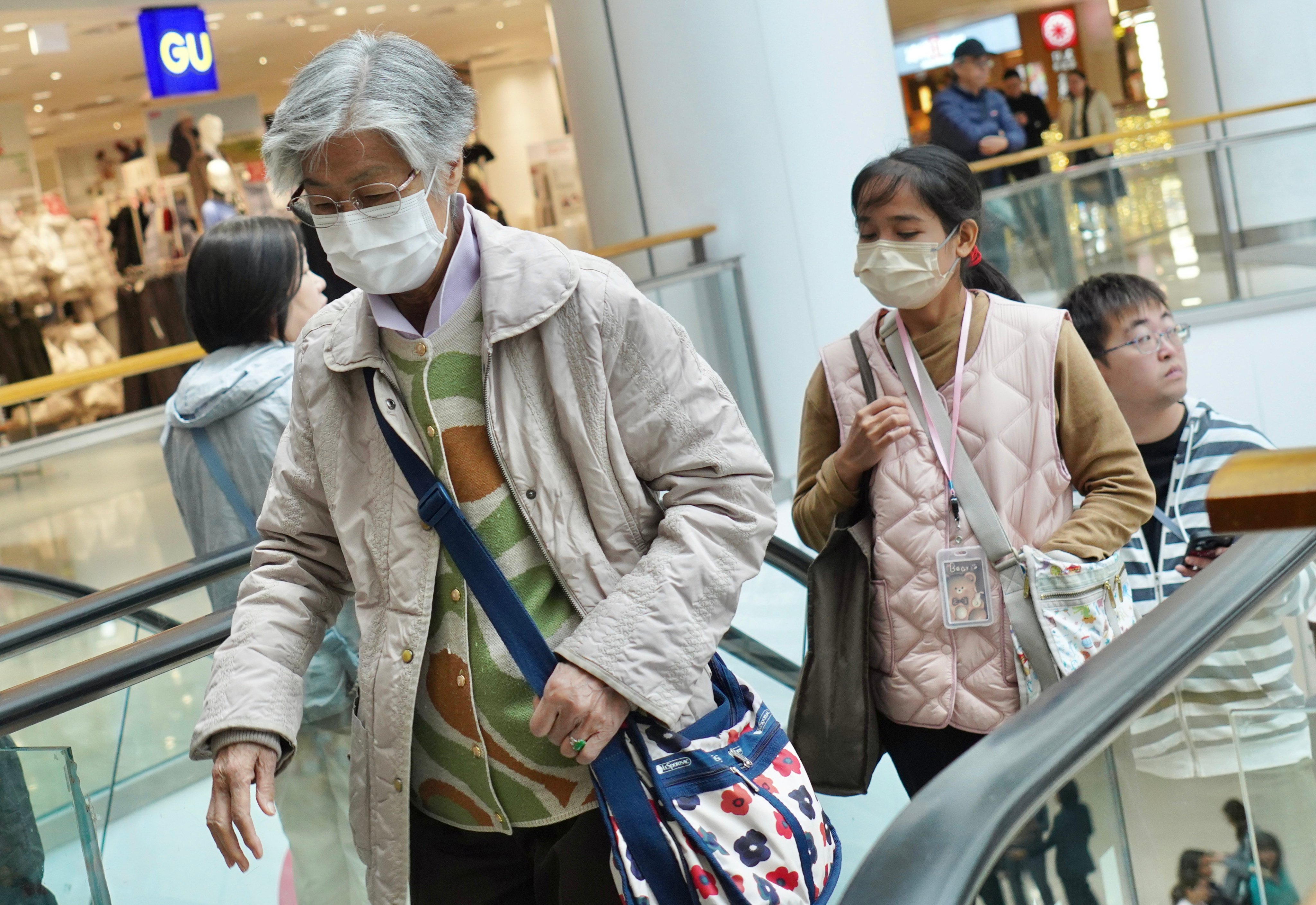 Shoppers wear masks inside a mall in Tai Kok Tsui. Hong Kong is experiencing a significant surge in influenza cases driven by a mutated strain frequently referred to as the “super flu”. Photo: Karma Lo
