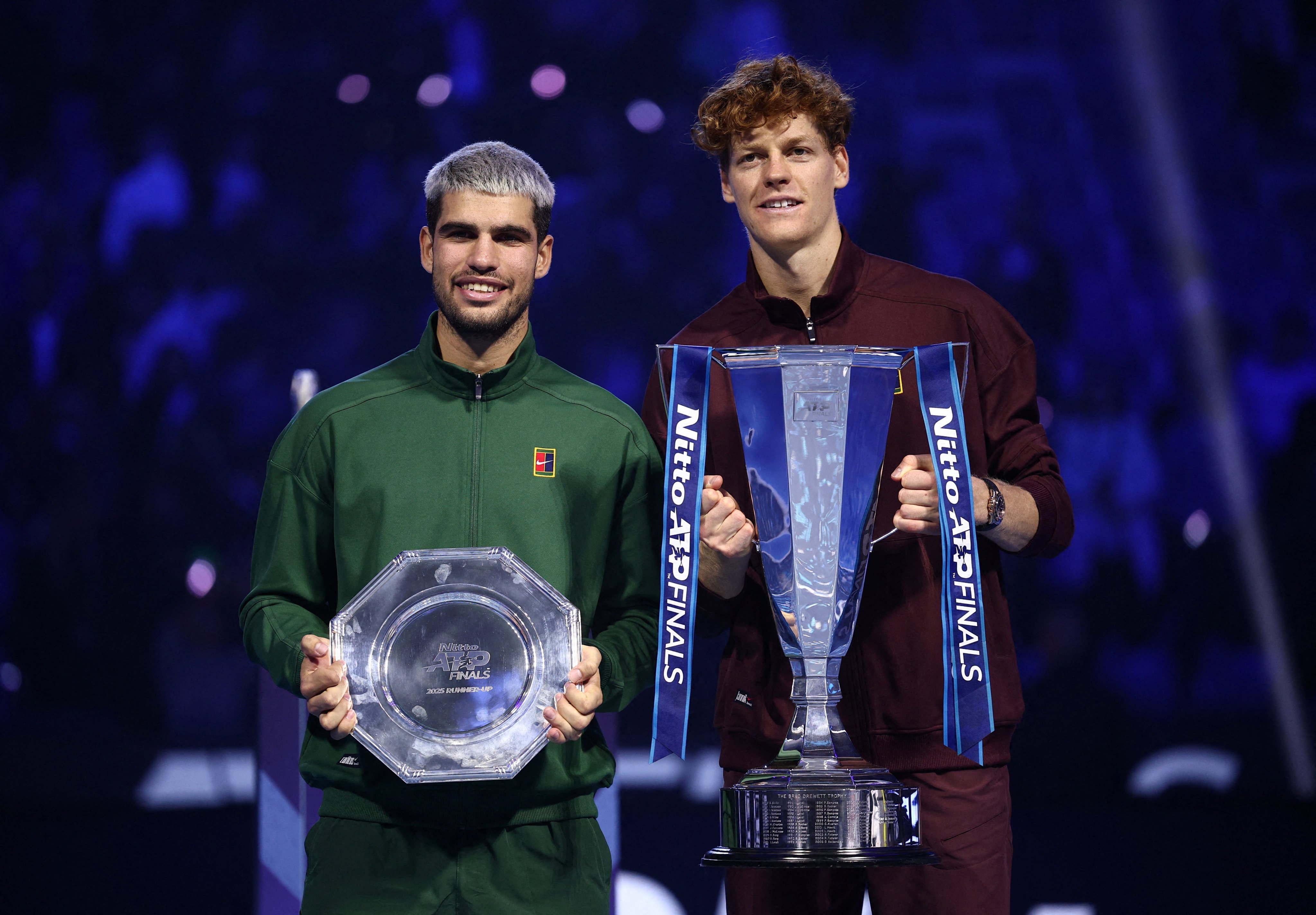 Italy’s Jannik Sinner (right) finished the year with the ATP Finals trophy while Spain’s Carlos Alcaraz was runner-up. Photo: Reuters