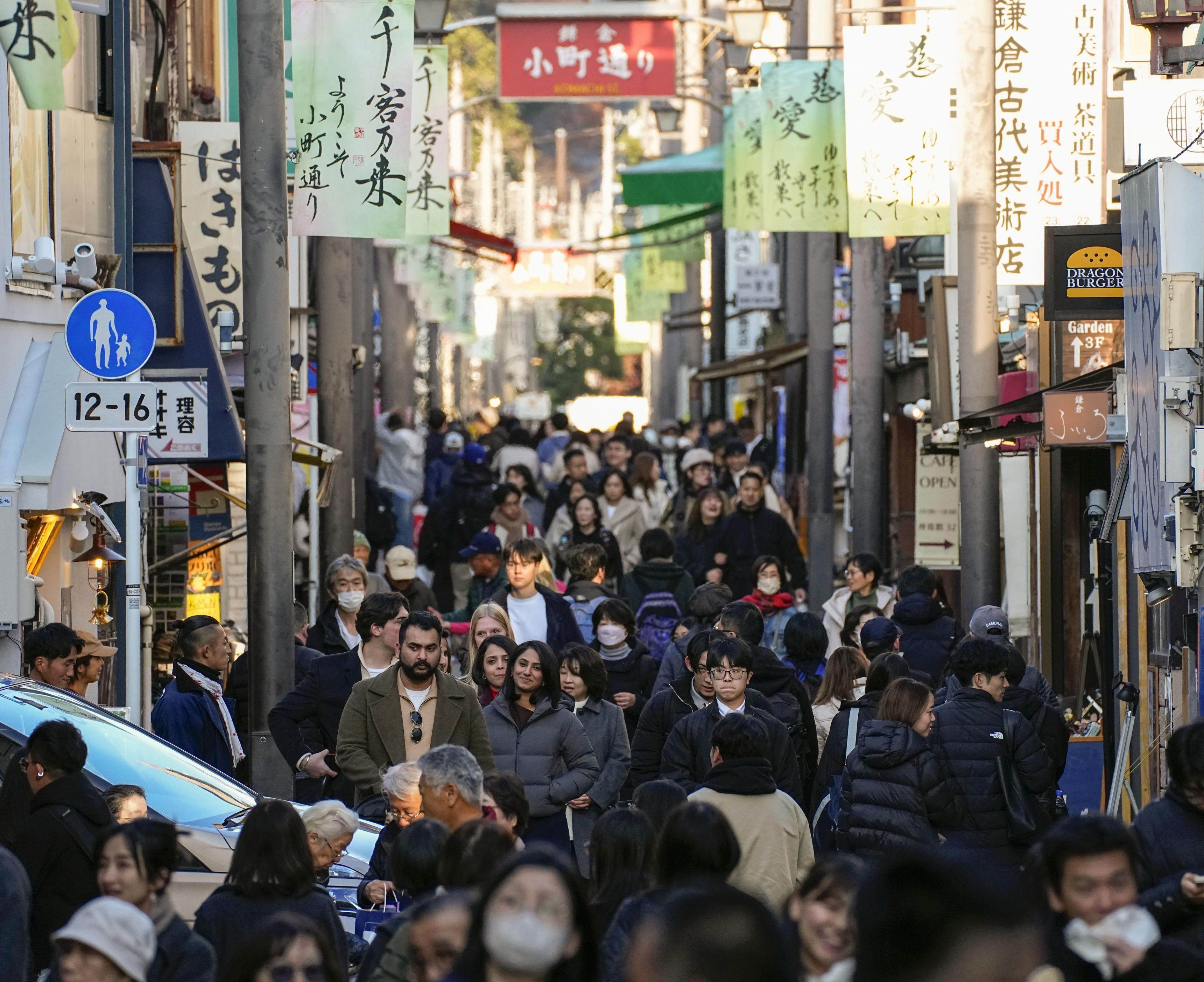 A street in Kamakura, in Japan’s Kanagawa prefecture, packed with tourists on December 17. Photo: Kyodo