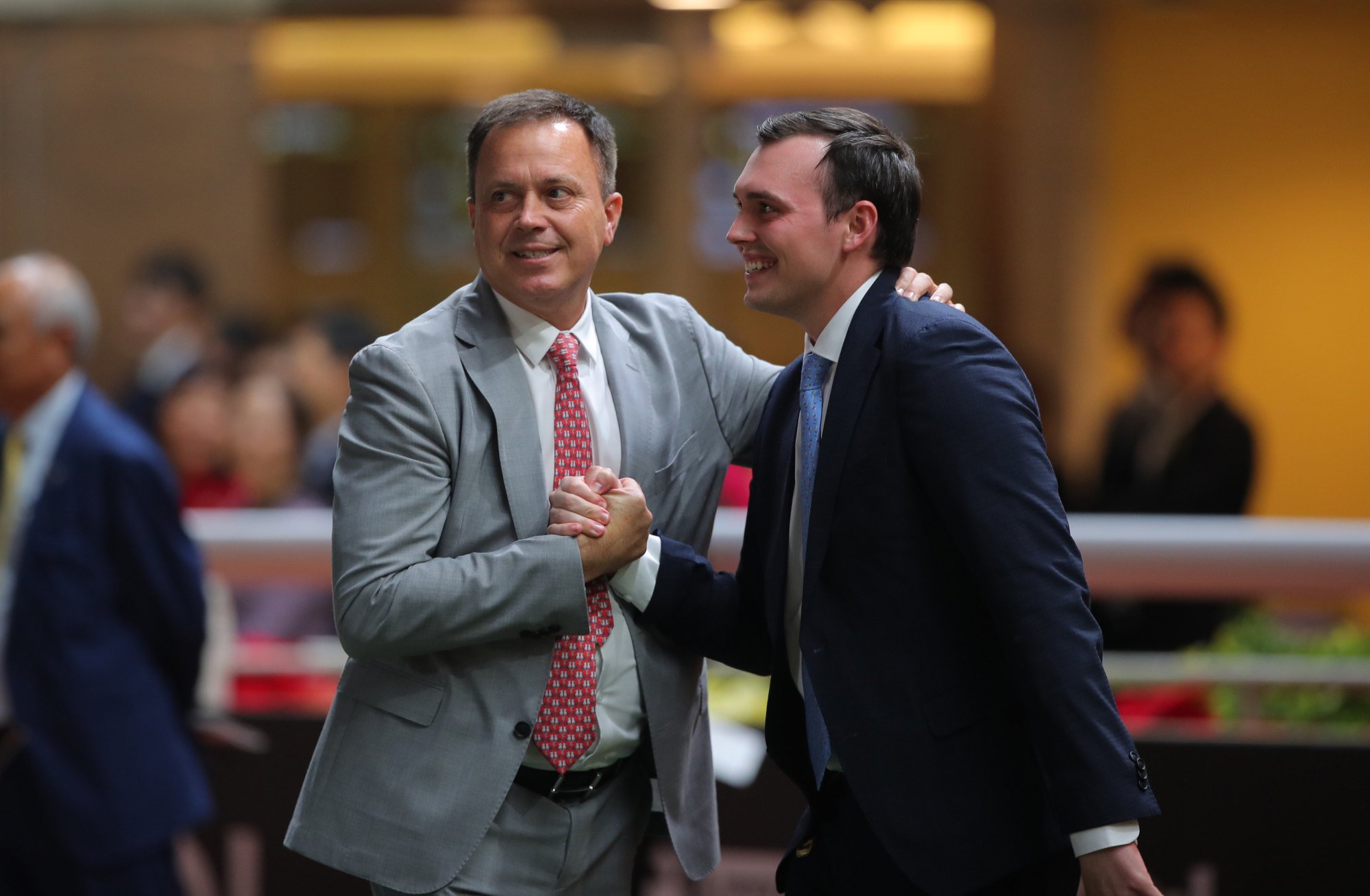 Caspar Fownes celebrates his Valley double on Tuesday night with son Ronan. Caspar Fownes celebrates his Valley double on Tuesday night with son Ronan.