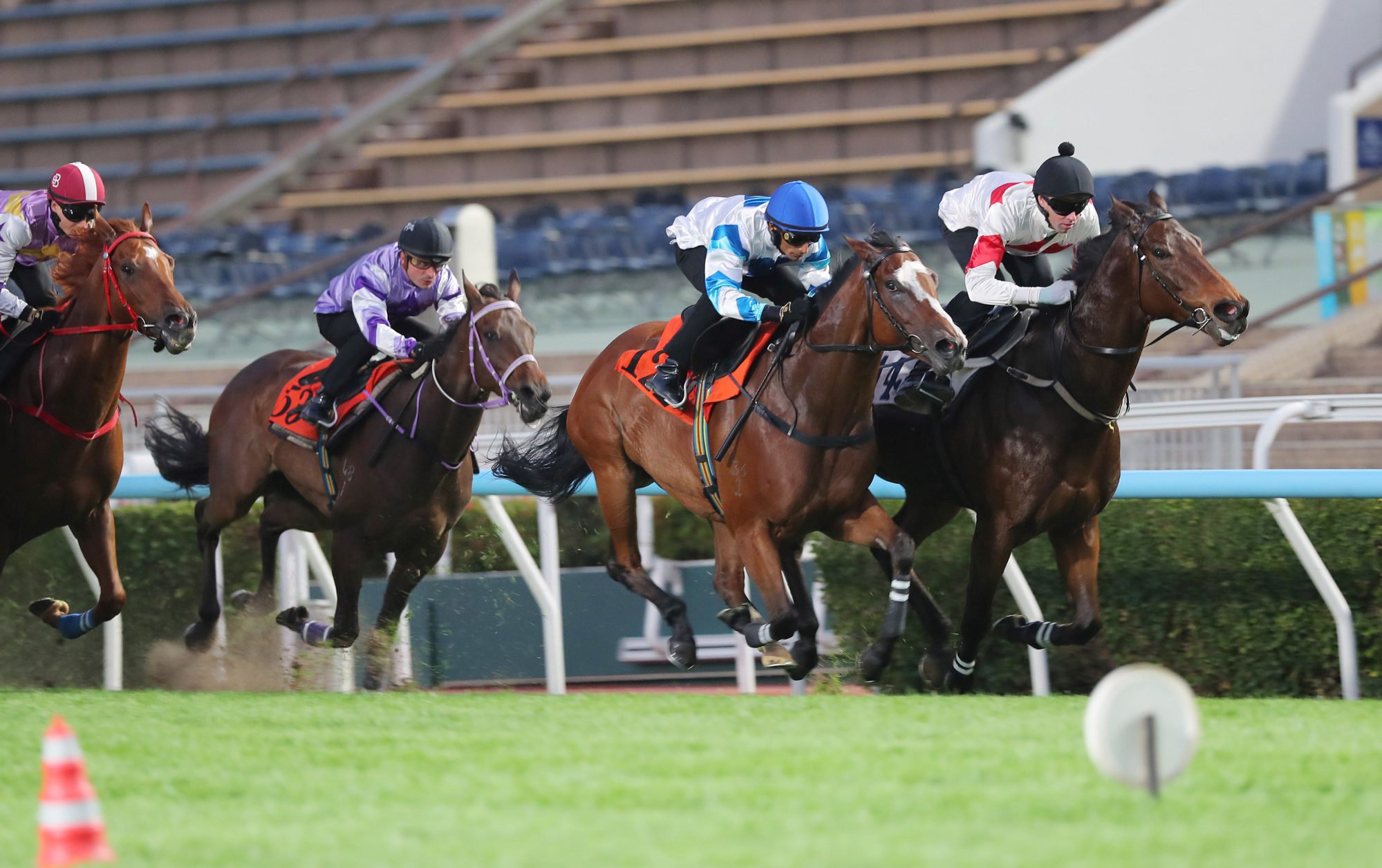 Magnifique (red and white) wins his most recent trial under James Orman.