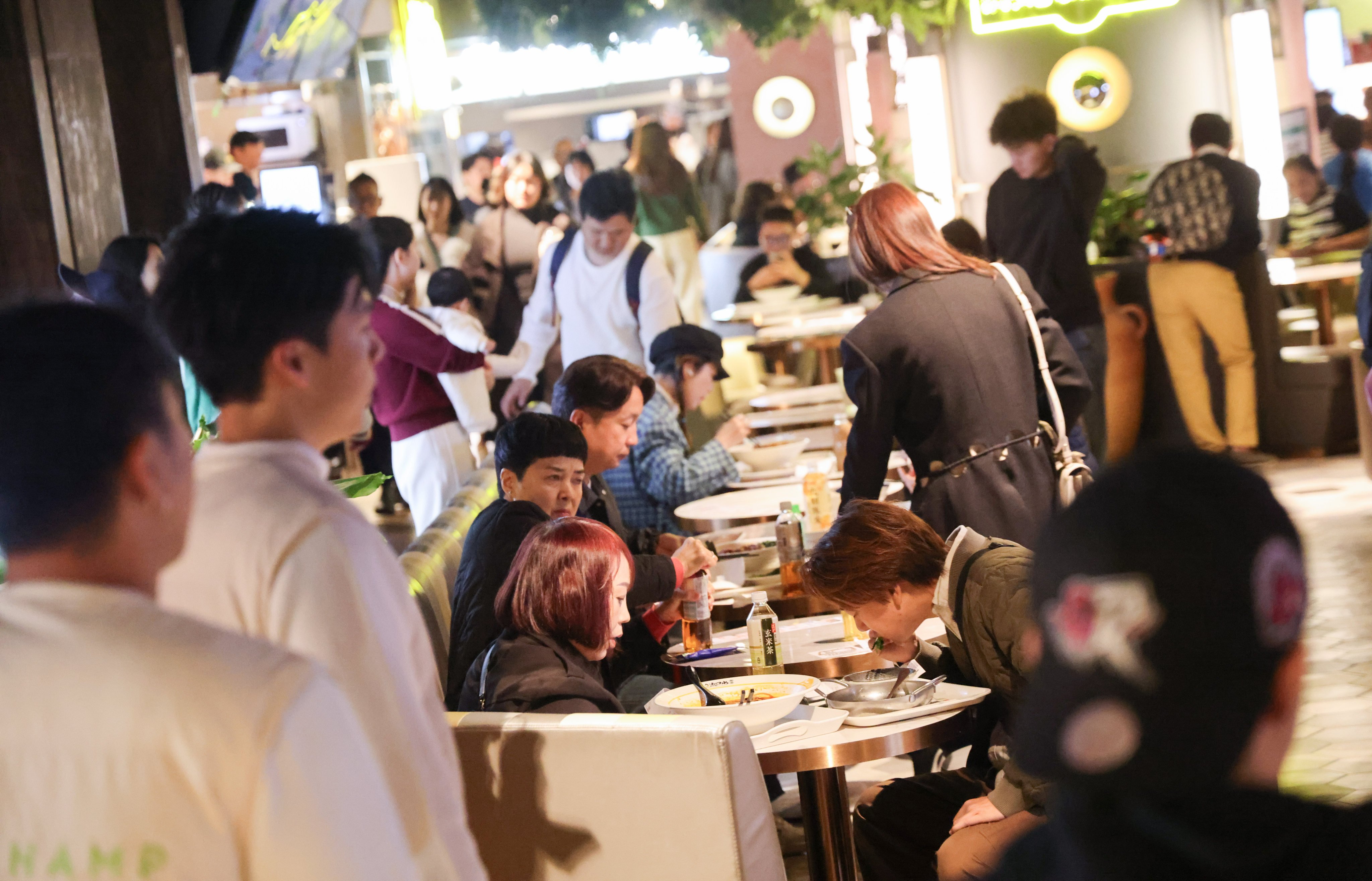 Diners at a restaurant in Tsim Sha Tsui. The city recorded a 10 per cent drop in restaurant sales. Photo: Jelly Tse
