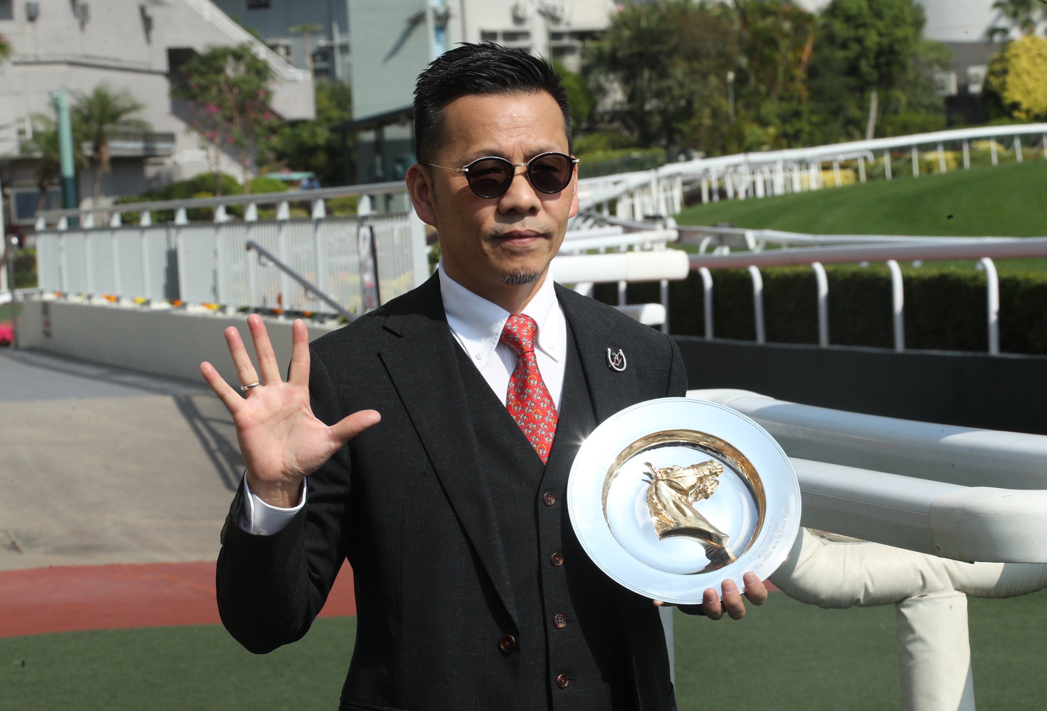 Frankie Lor celebrates his 500th winner at Sha Tin. Photos: Kenneth Chan