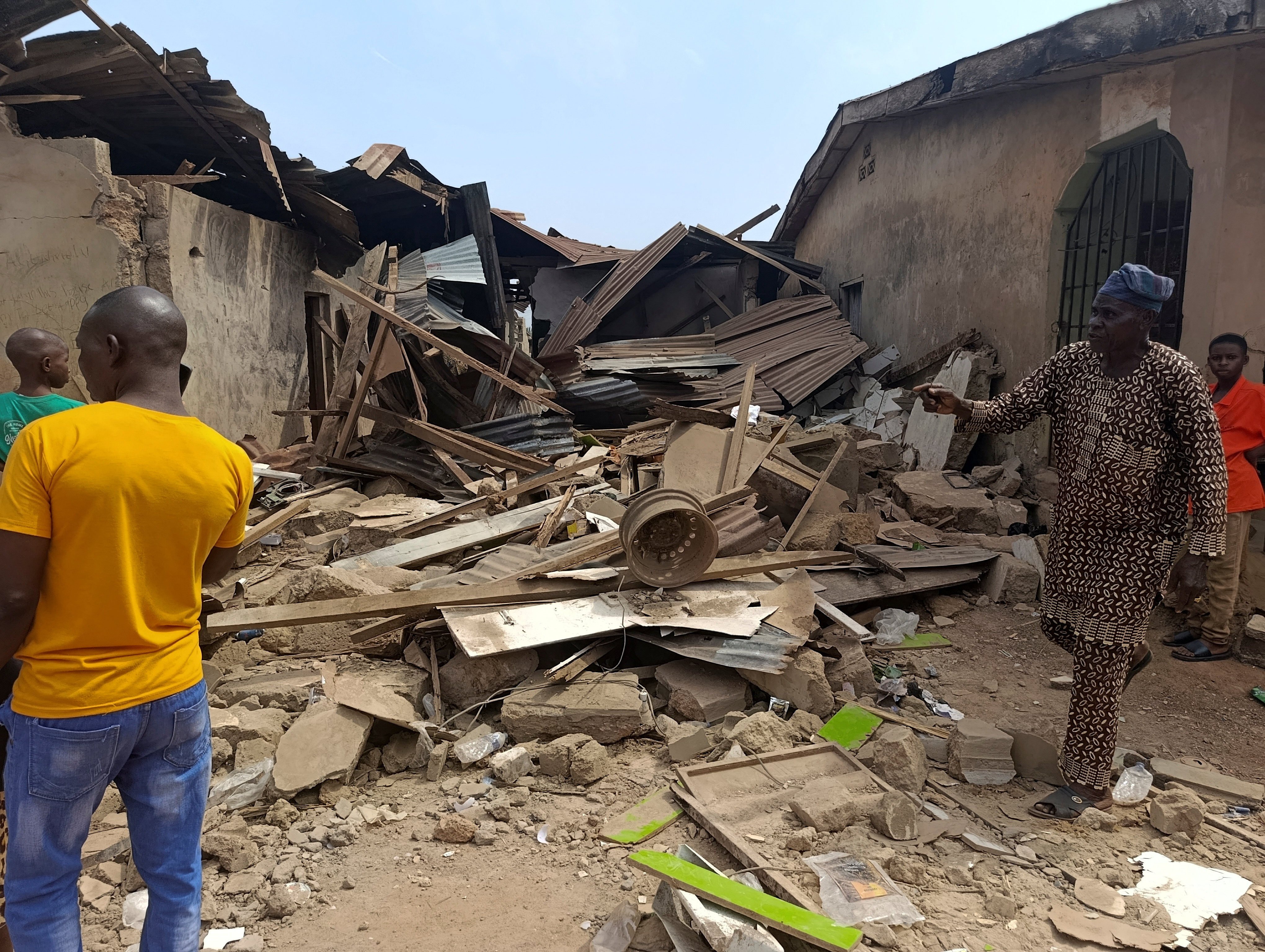 Residents inspect the damage the day after US forces launched a strike against Islamic State militants, in Offa, Kwara State, Nigeria on Friday. Photo: Reuters