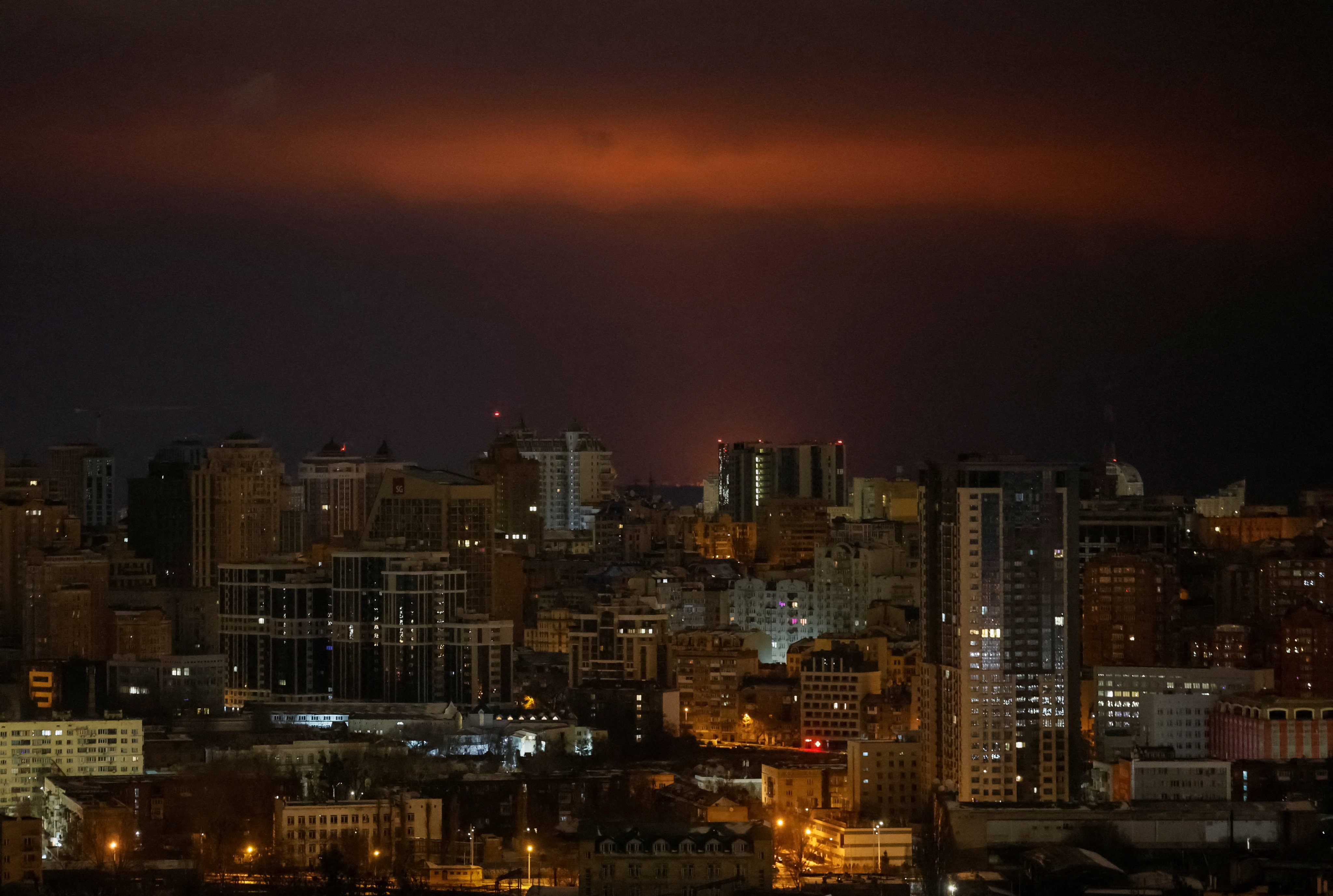 An explosion lights up the sky over Kyiv during a Russian missile and drone strike on Saturday, Photo: . Reuters