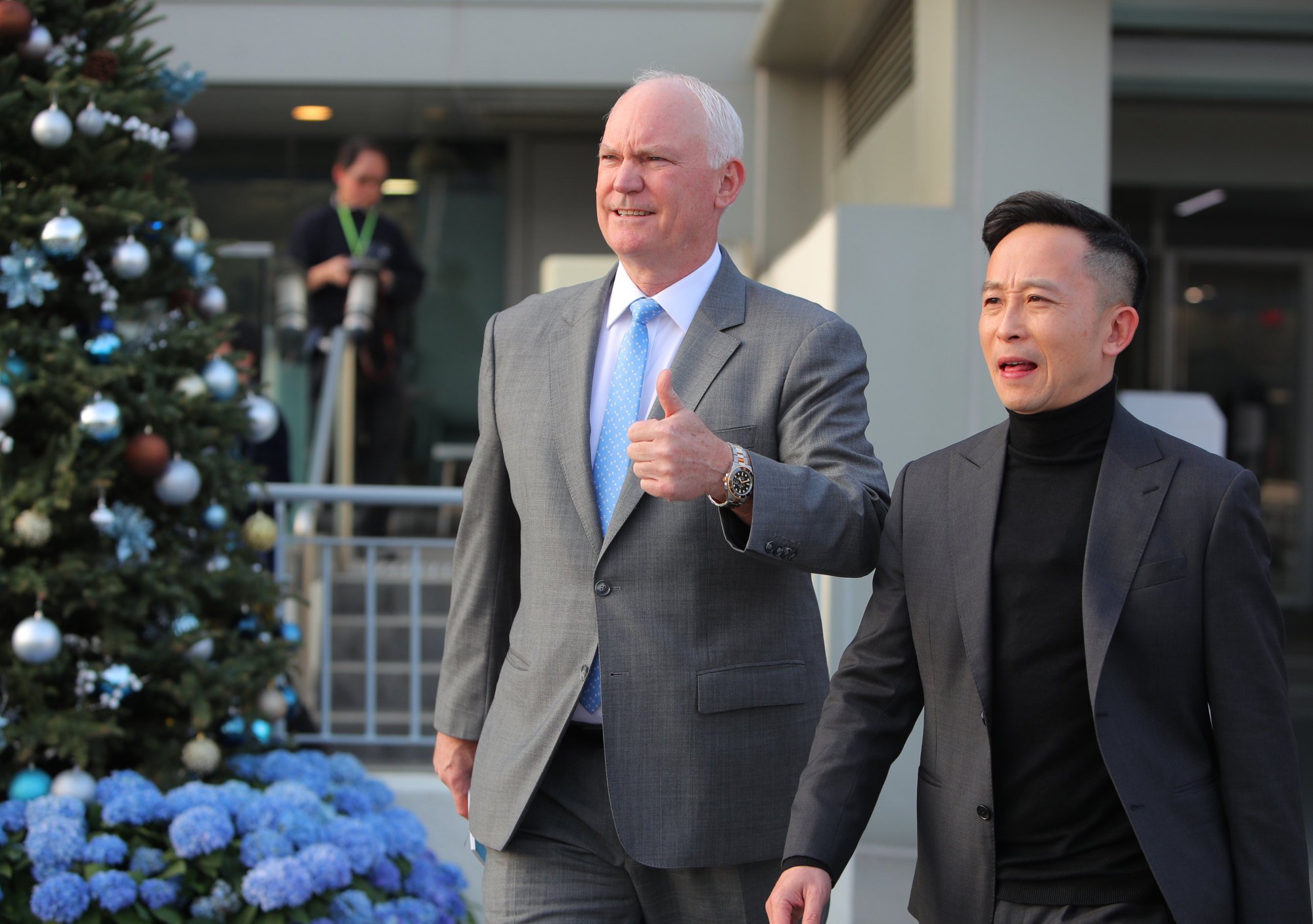 Trainer David Hall celebrates after Magnifique’s win.