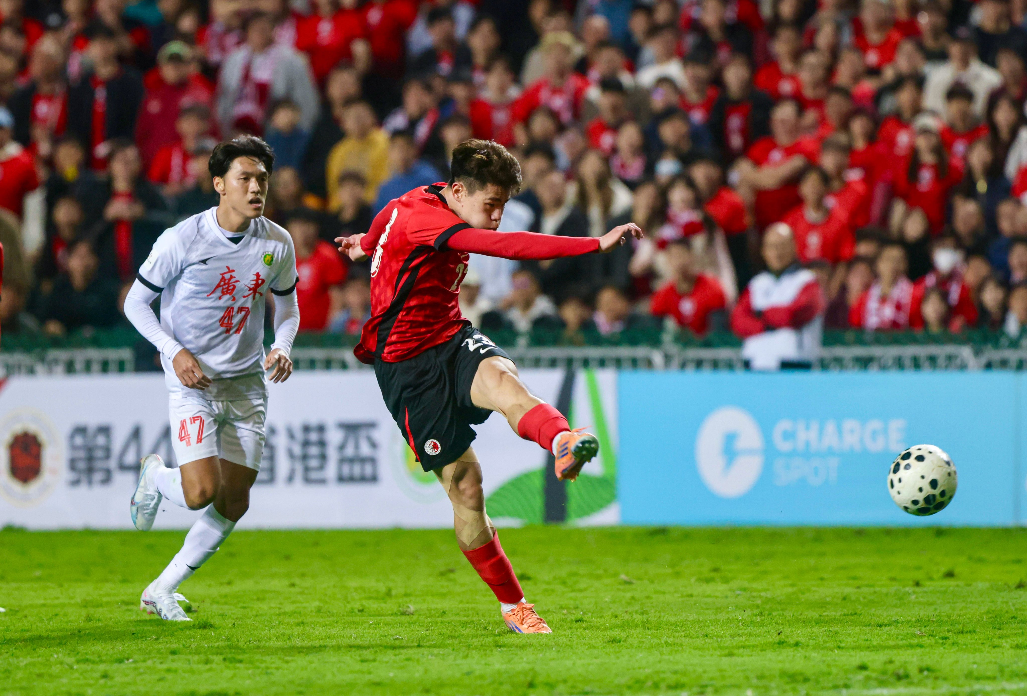 Hong Kong’s Sun Ming-him (right) fires his side ahead at Hong Kong Stadium. Photo: Jonathan Wong
