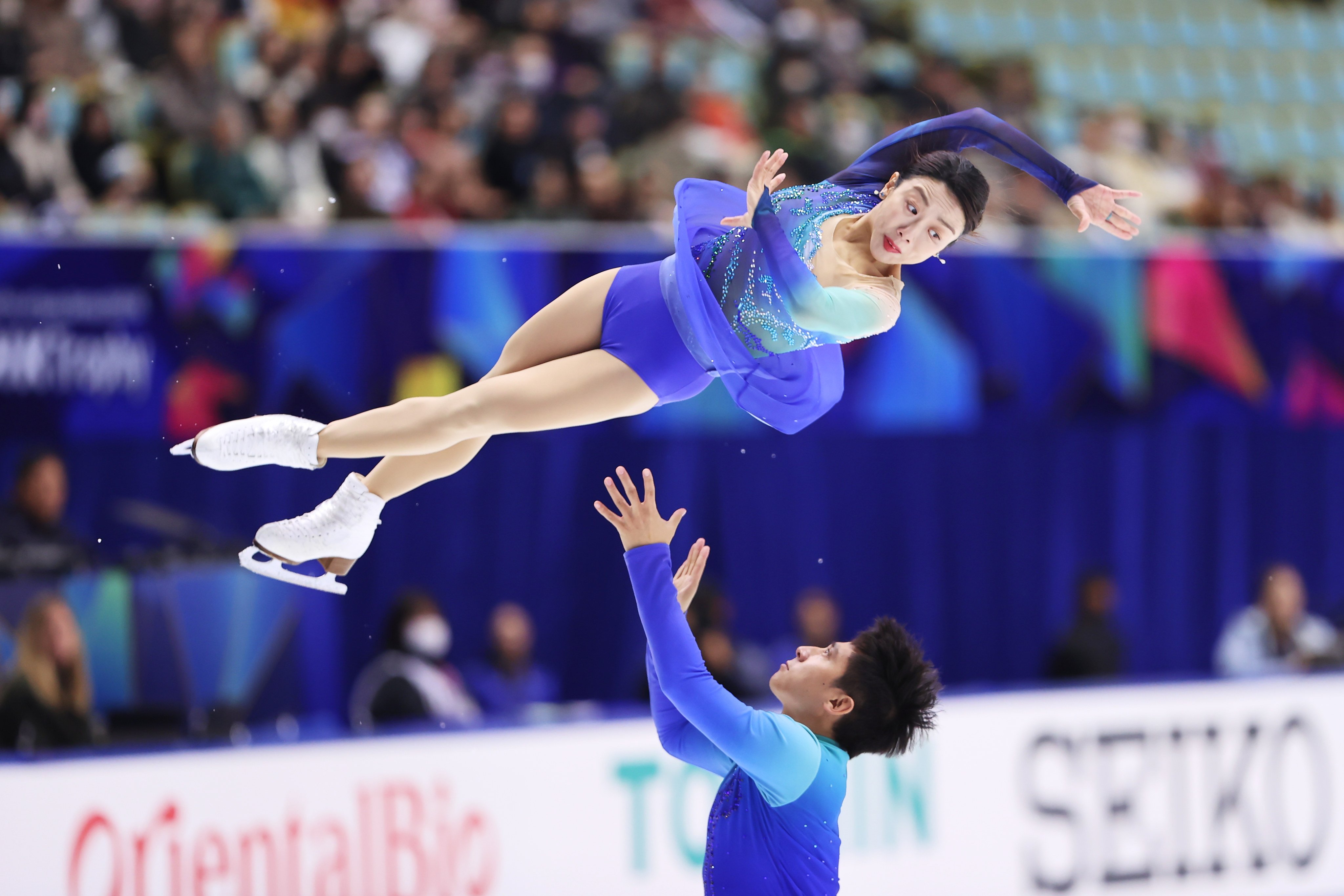 Han Cong (bottom) and Sui Wenjing perform on day two of the ISU Figure Skating Grand Prix in Osaka in November. Photo: Getty Images