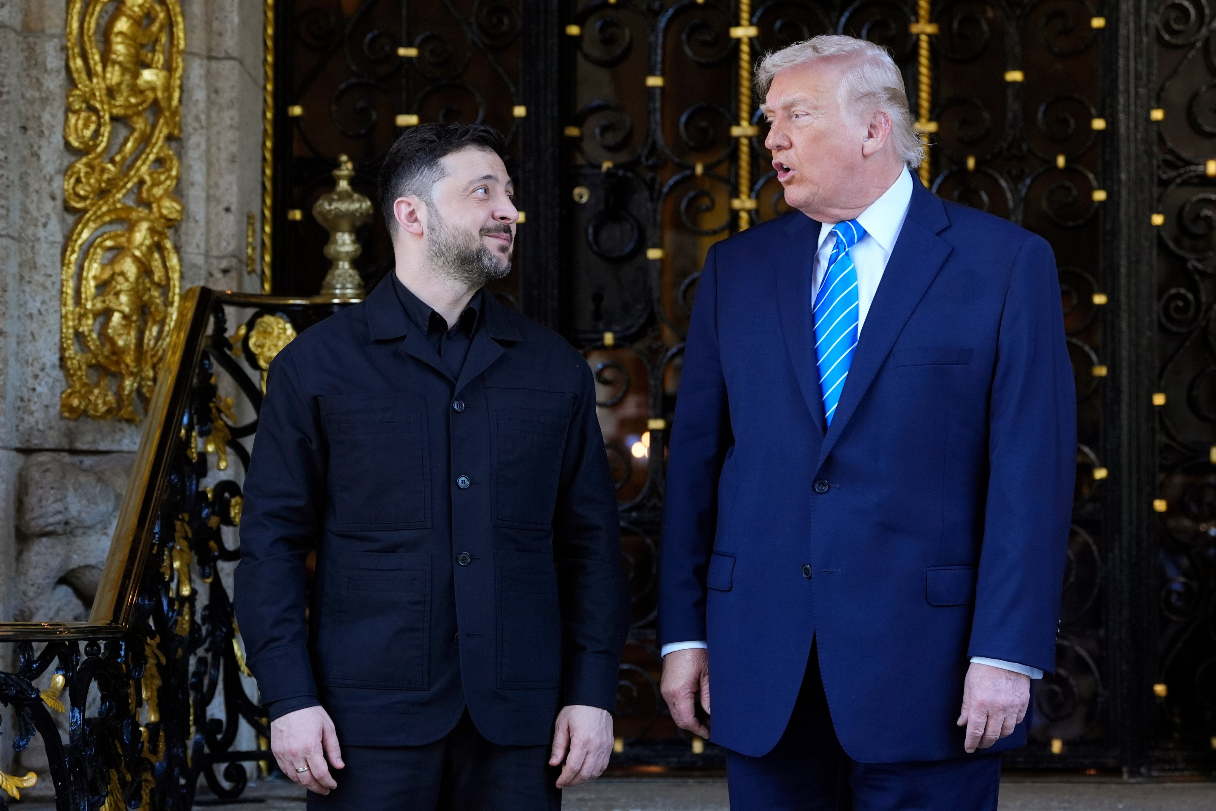 US President Donald Trump, right, greets Ukraine’s President Volodymyr Zelensky at his Mar-a-Lago club in West Palm Beach, Florida on Sunday. Photo: AP