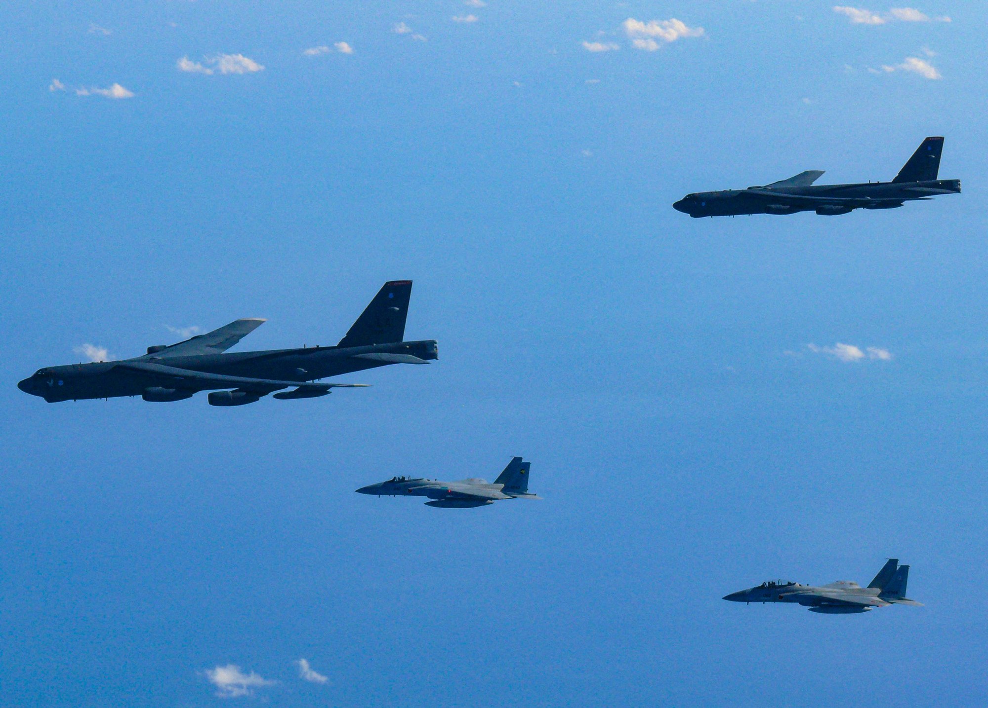 Japanese F-15 fighter jets take part in a joint drill with US B-52 bombers over the Sea of Japan on December 10. Photo: Handout via Reuters Japanese F-15 fighter jets take part in a joint drill with US B-52 bombers over the Sea of Japan on December 10. Photo: Handout via Reuters