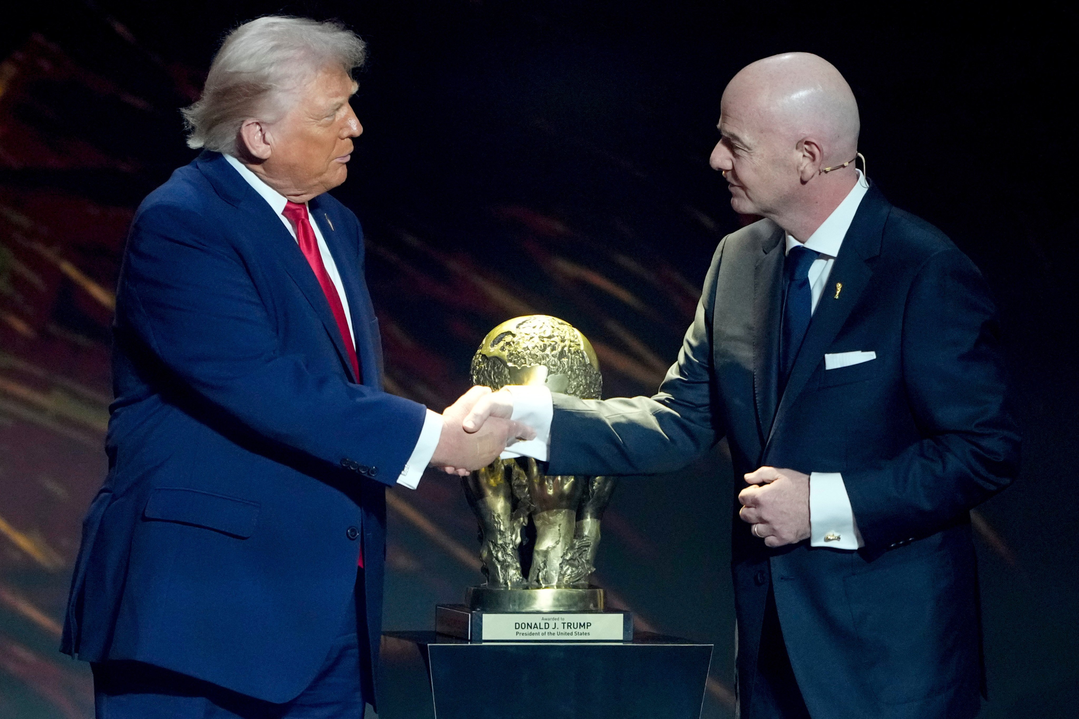 Fifa president Gianni Infantino awards US President Donald Trump with the Fifa Peace Prize during the draw for the 2026 World Cup. Photo: AP