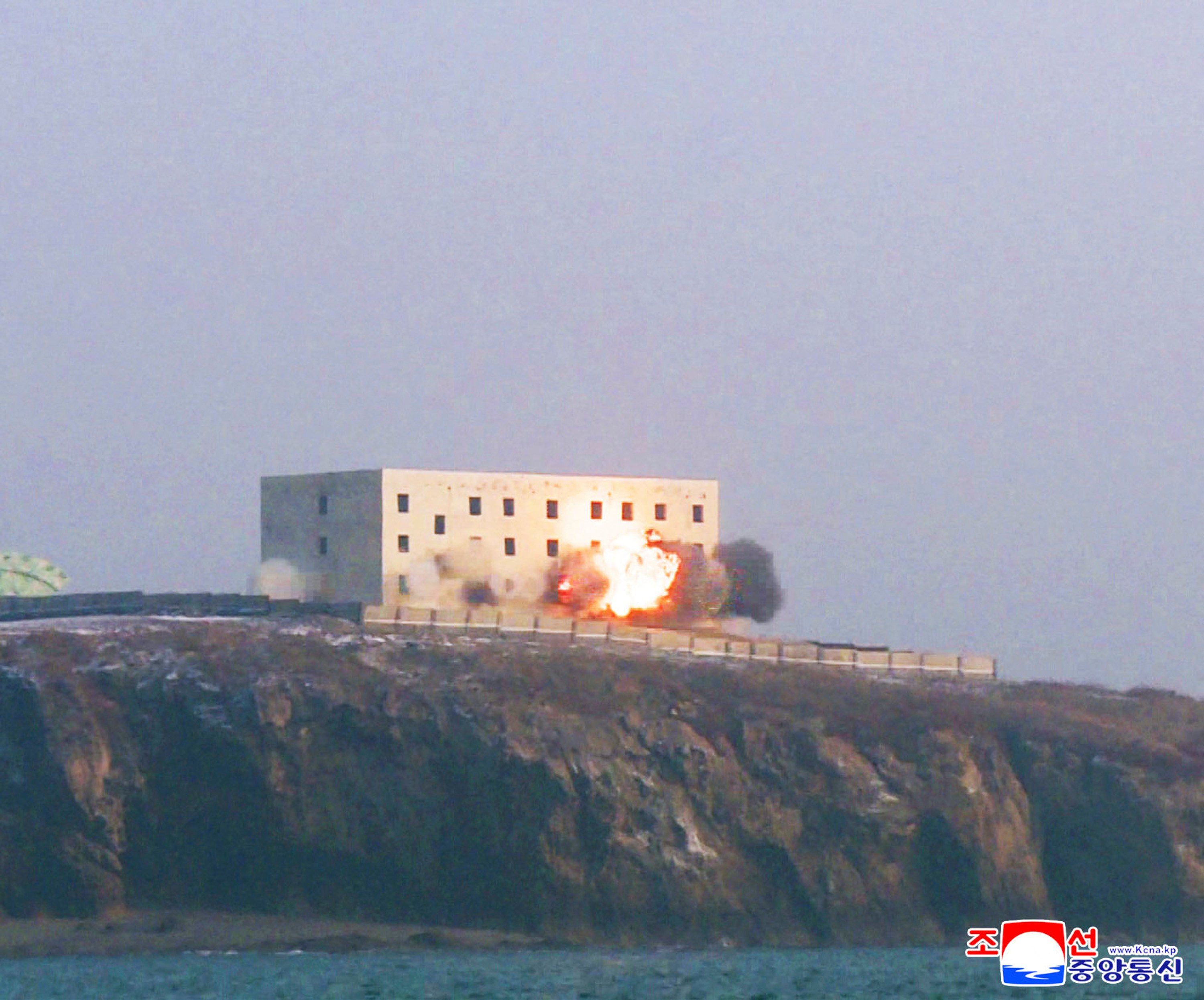 A North Korean long-range strategic cruise missile hitting its target on Sunday. Photo: KCNA via AFP
