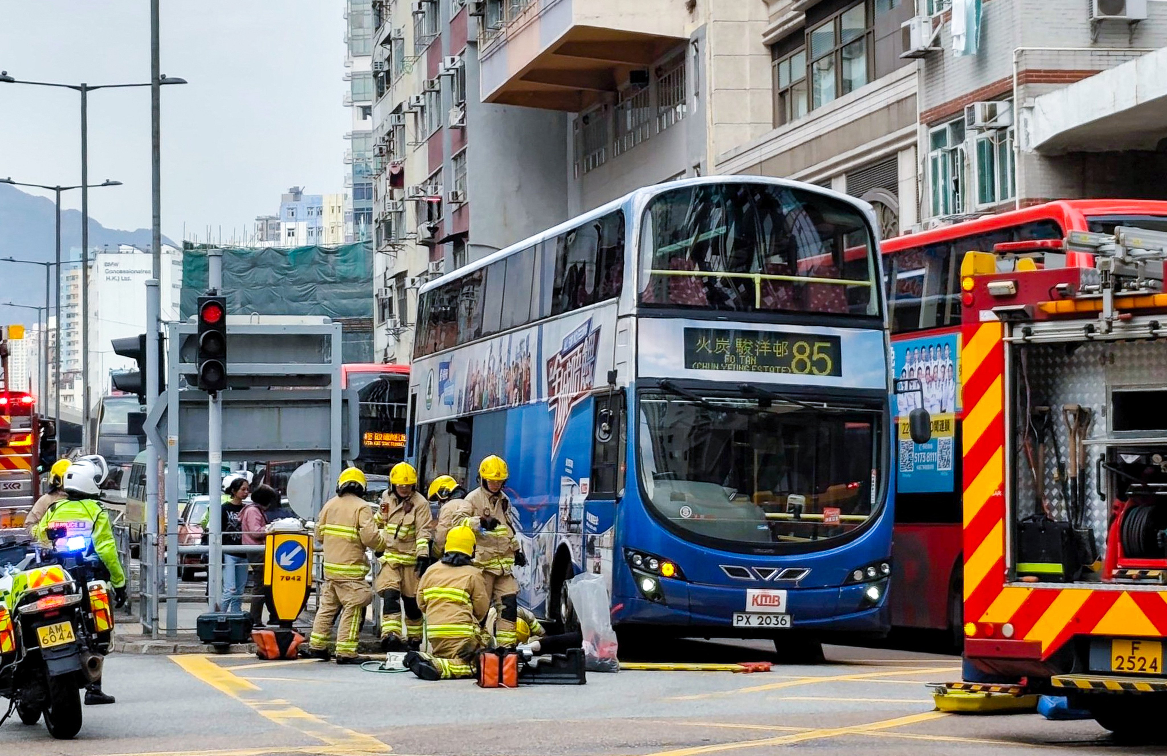 The woman was knocked down by a double-decker bus and trapped underneath it. Photo: Handout