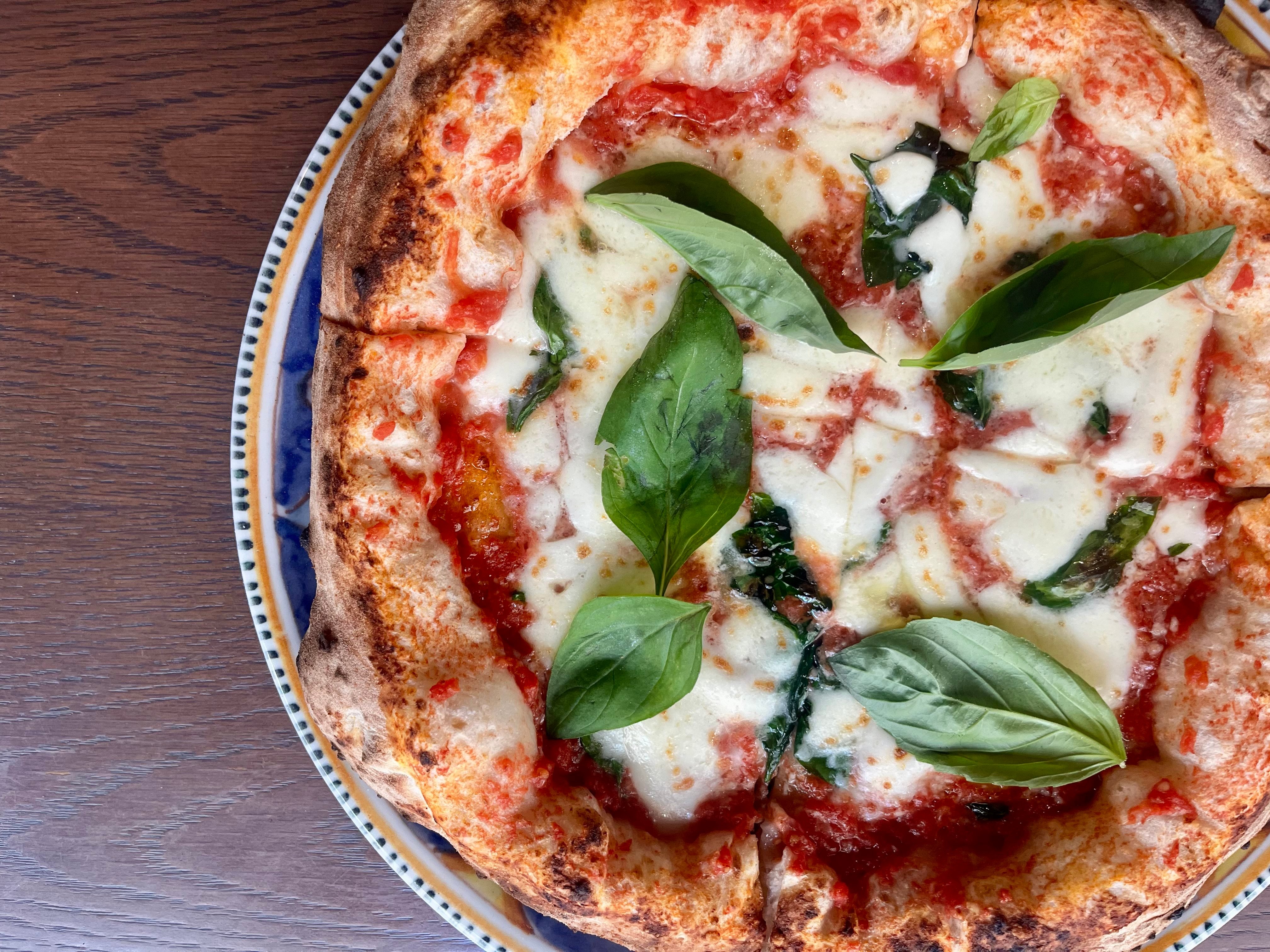 A Margherita pizza from Little Napoli in Hong Kong’s Wan Chai district.  Little Napoli is a favourite destination for Hong Kong clarinettist and conductor Lorenzo Iosco. Photo: Kylie Knott