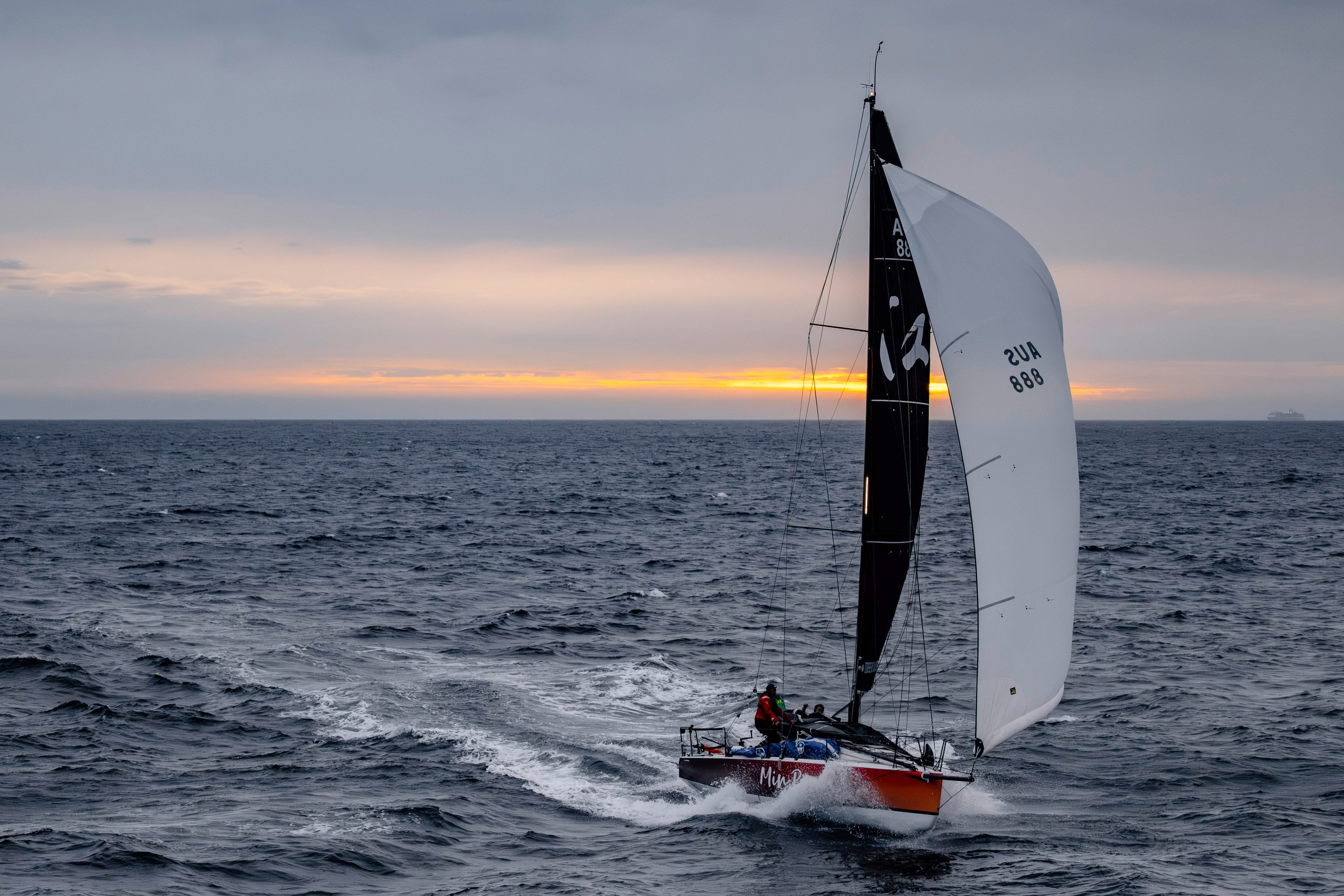 Min River, sailed by Jiang Lin and Alexis Loison, approaches the finish of the Sydney Hobart Yacht Race. Photo: AP