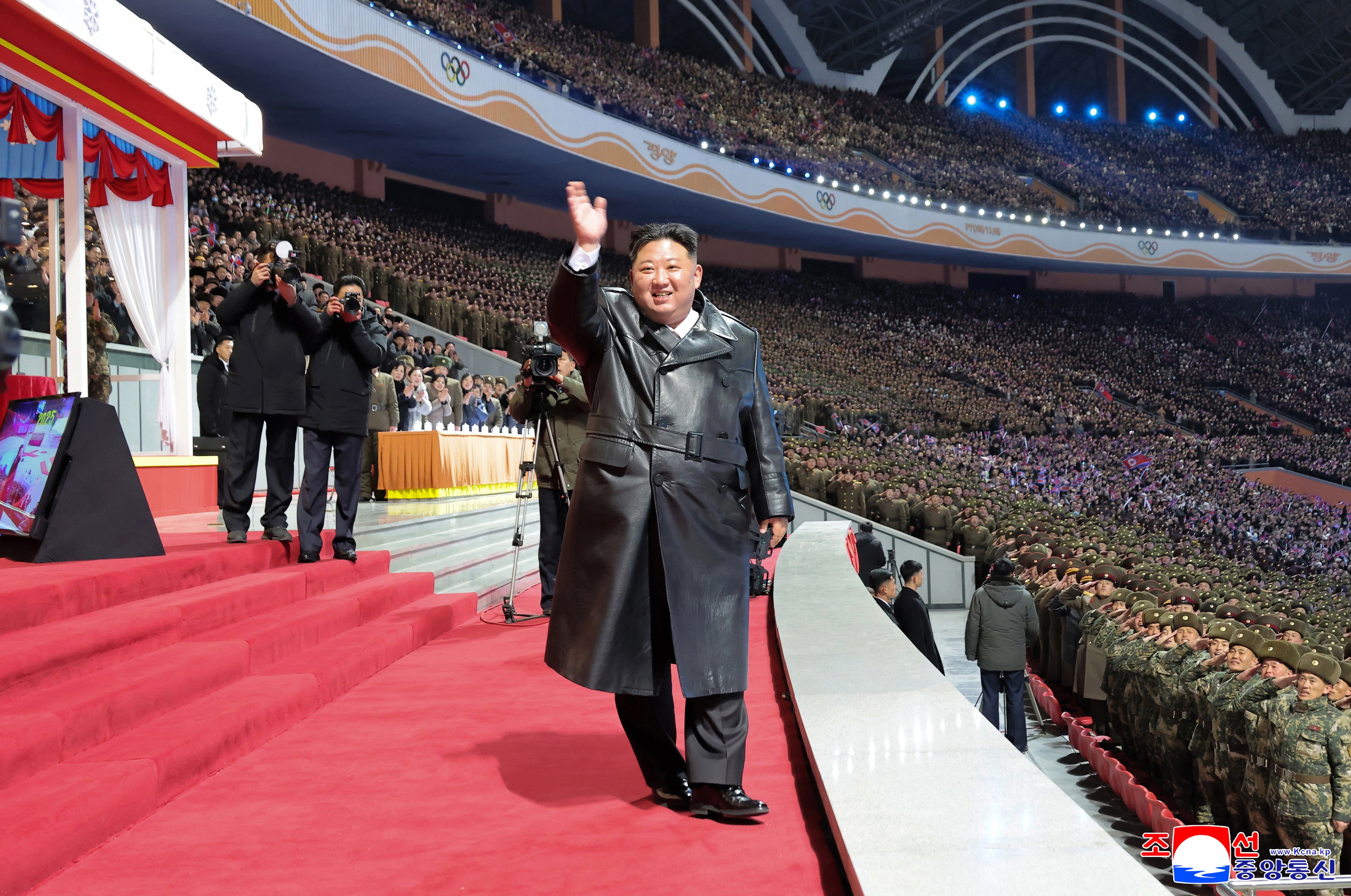 North Korean leader Kim Jong-un waving during an art performance celebrating the new year at the May Day Stadium in Pyongyang, North Korea, on Thursday. Photo: EPA/KCNA