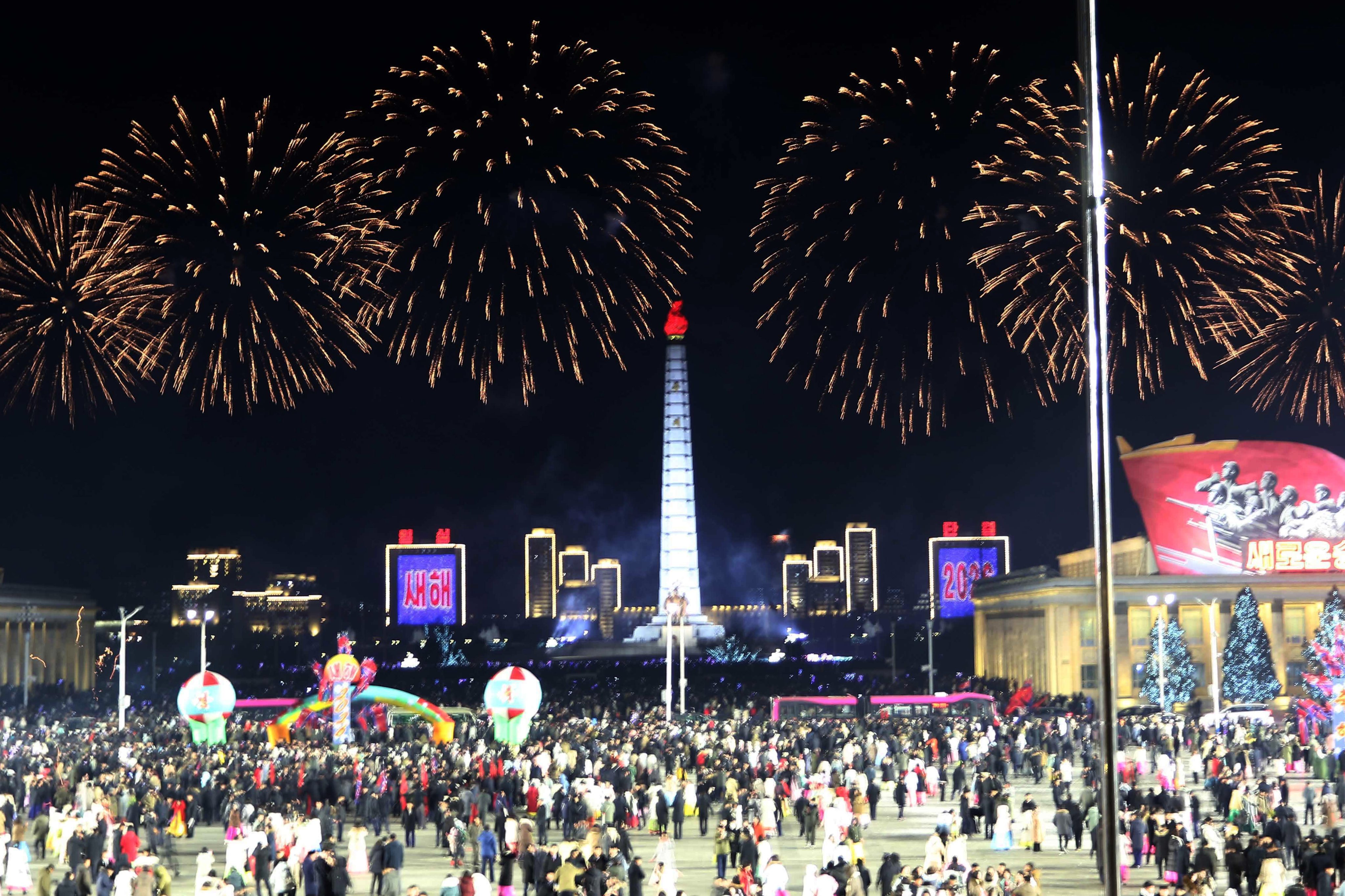 Fireworks explode as North Koreans usher in the new year at Kim Il-sung Square in Pyongyang on Thursday. Photo: AP