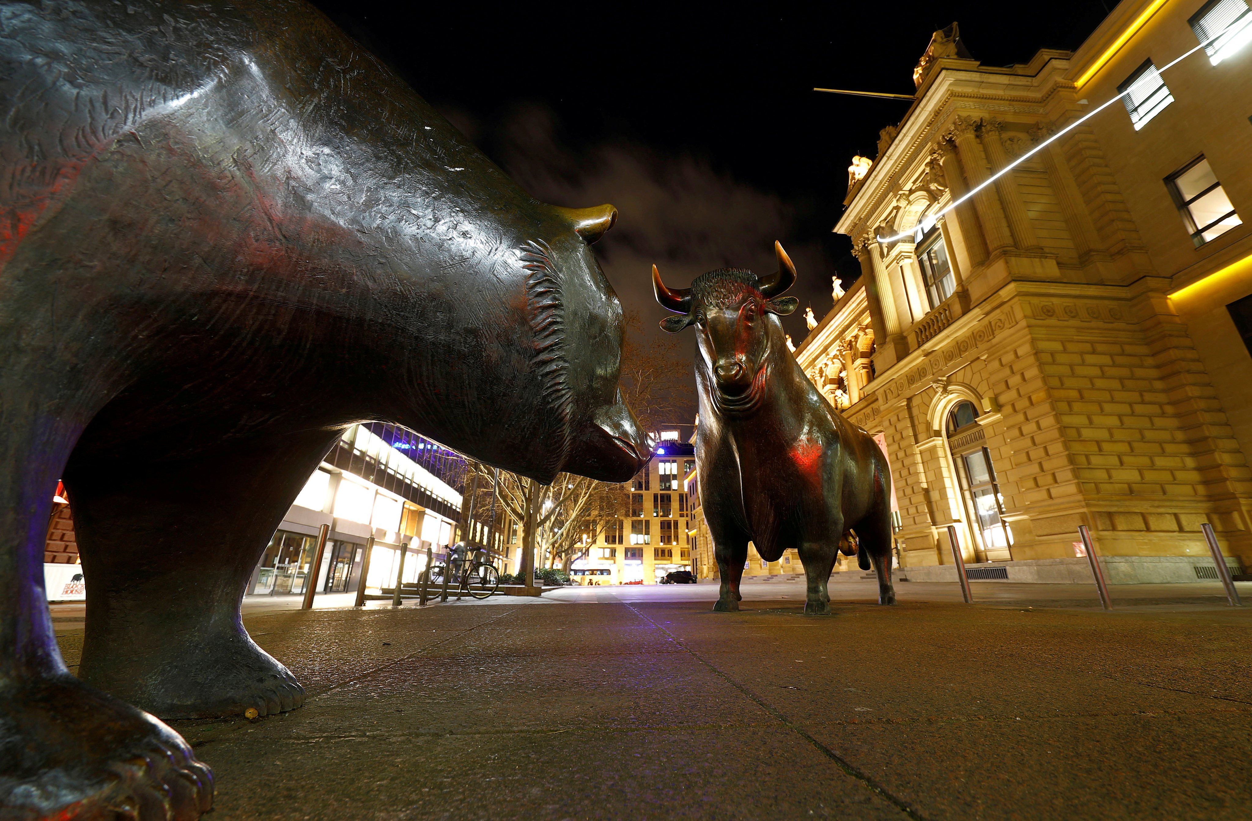 Statues of a bull and a bear face off in front of the German stock exchange in Frankfurt. Photo: Reuters