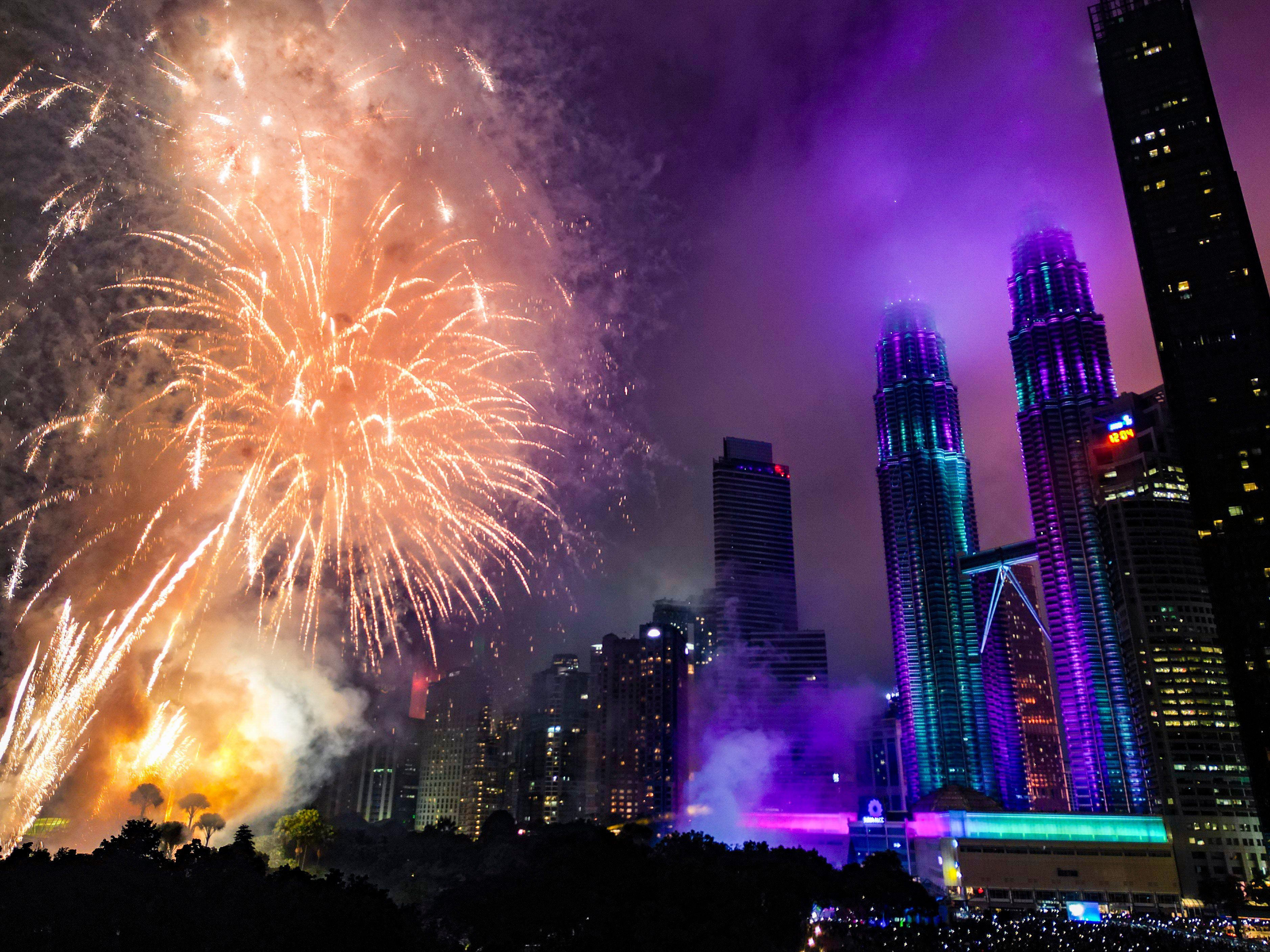 Fireworks explode near the Petronas Twin Towers during New Year’s Eve celebrations in Kuala Lumpur, Malaysia. Photo: Xinhua