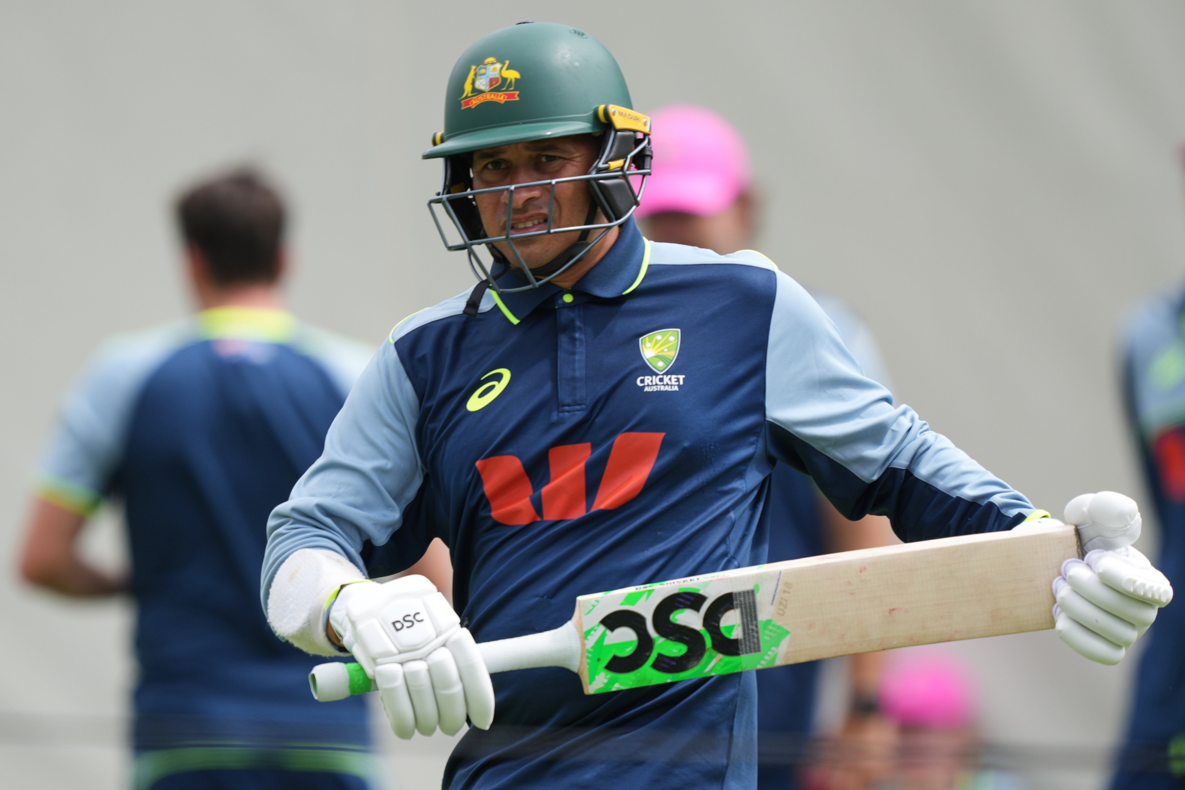Australia Usman Khawaja warms up during a practice session ahead of the fifth and final Ashes Test in Sydney. Photo: AP