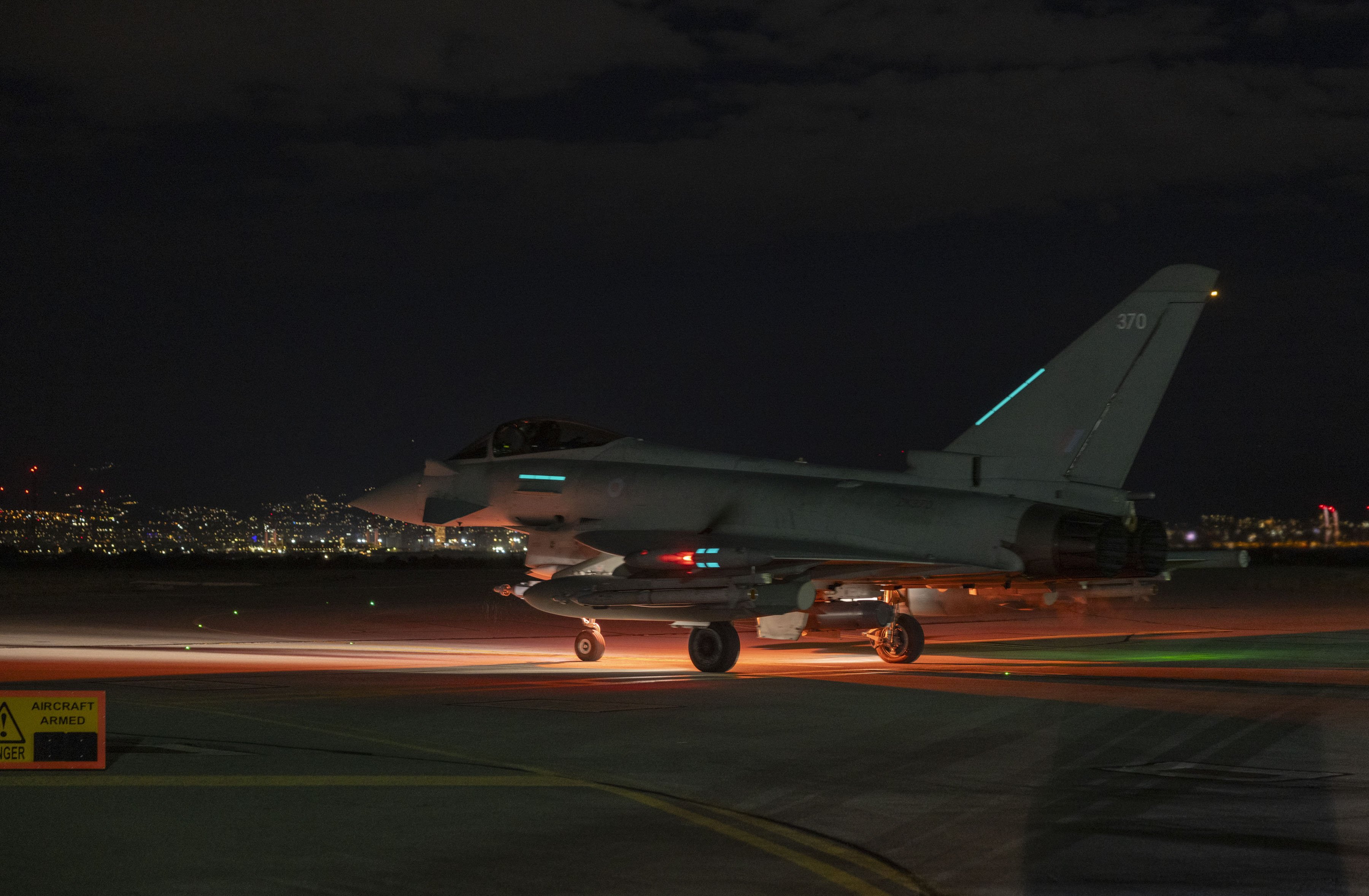 A UK Royal Air Force Typhoon aircraft at an undisclosed location in the Middle East. RAF Typhoon FGR4s joined French aircraft in a joint strike against the Daesh group in Syria on Saturday, the UK defence ministry said. Photo: EPA / SGT Lee Goddard / Handout