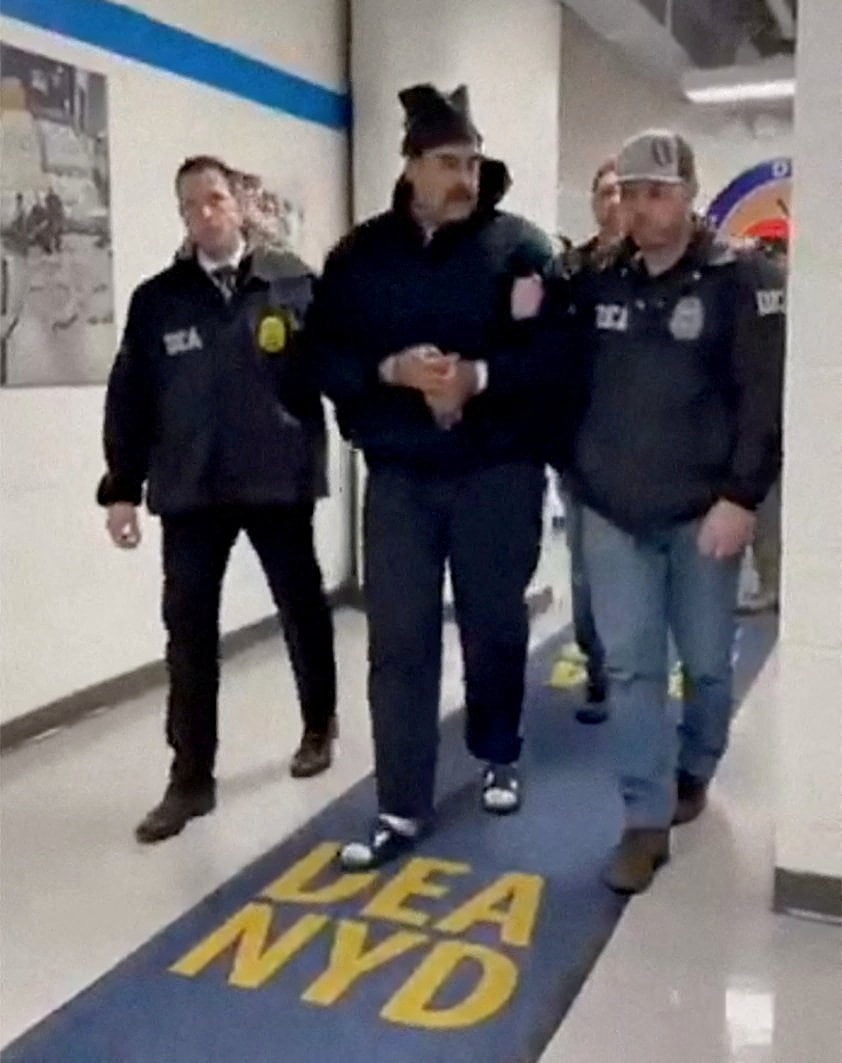 Venezuela’s President Nicolas Maduro in custody at the offices of the US Drug Enforcement Administration (DEA) in New York City. Photo: @RapidResponse47 via Reuters