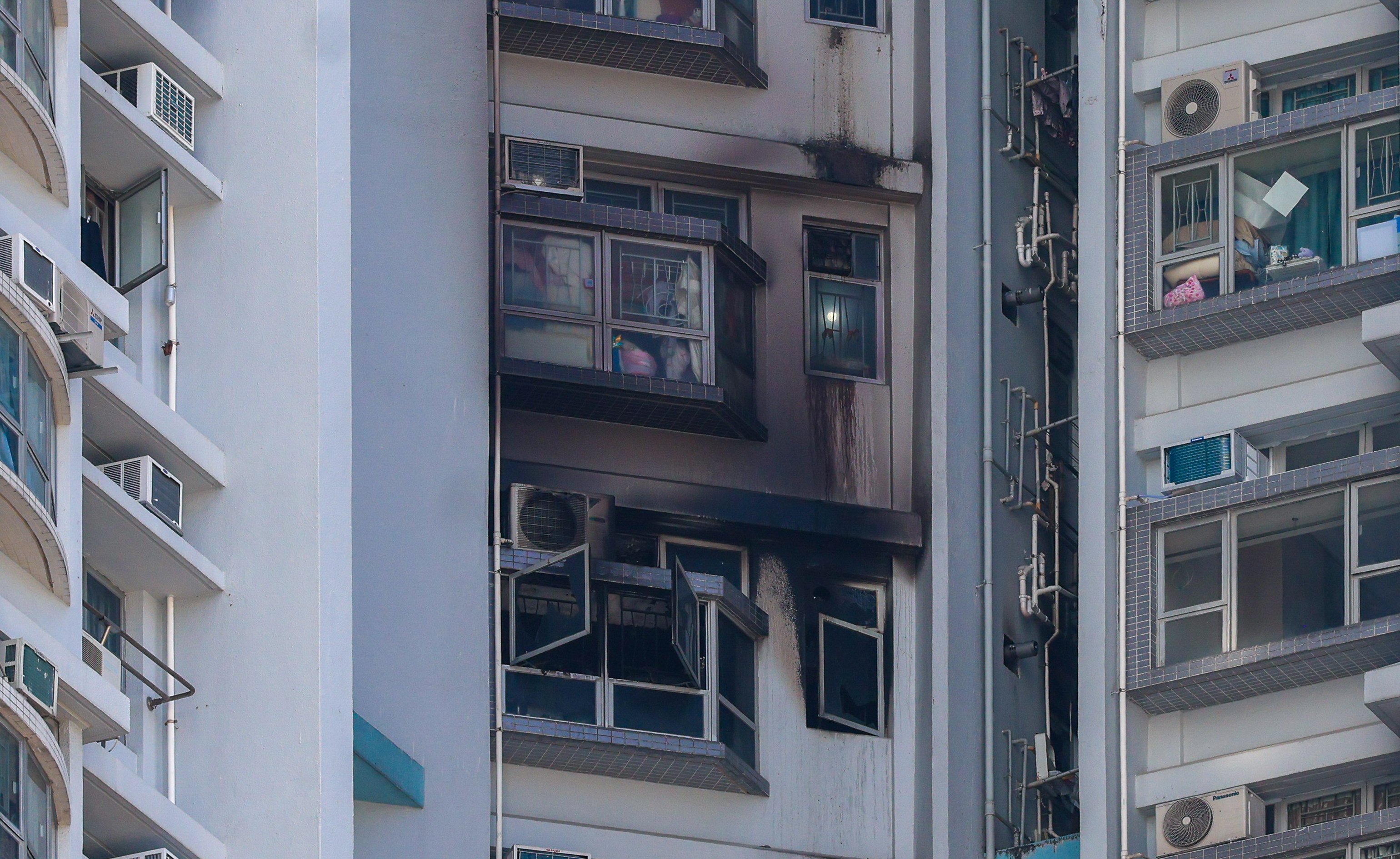 One person has been killed and eight injured in a fire at Mei Yu House in Shek Kip Mei, which forced the evacuation of more than  250 residents. Photo: Dickson Lee