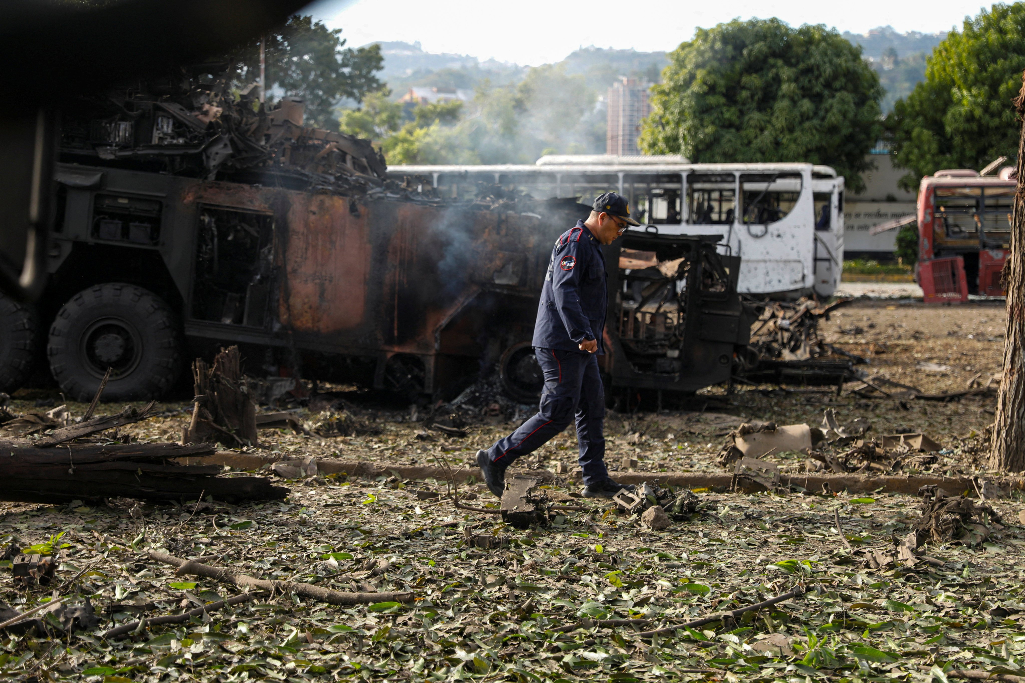 A firefighter walks past a destroyed anti-aircraft unit at La Carlota military base in Caracas following a US strike that captured Venezuelan leader Nicolas Maduro on Saturday. Photo: Reuters