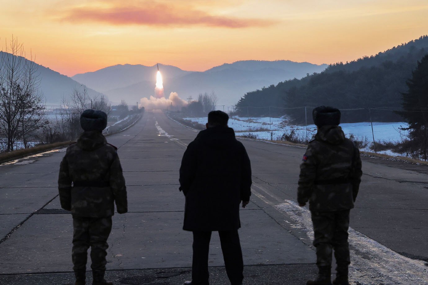 North Korean leader Kim Jong-un (centre) inspects test-flights of hypersonic missiles in Pyongyang on Sunday. Photo: KCNA/KNS/AP