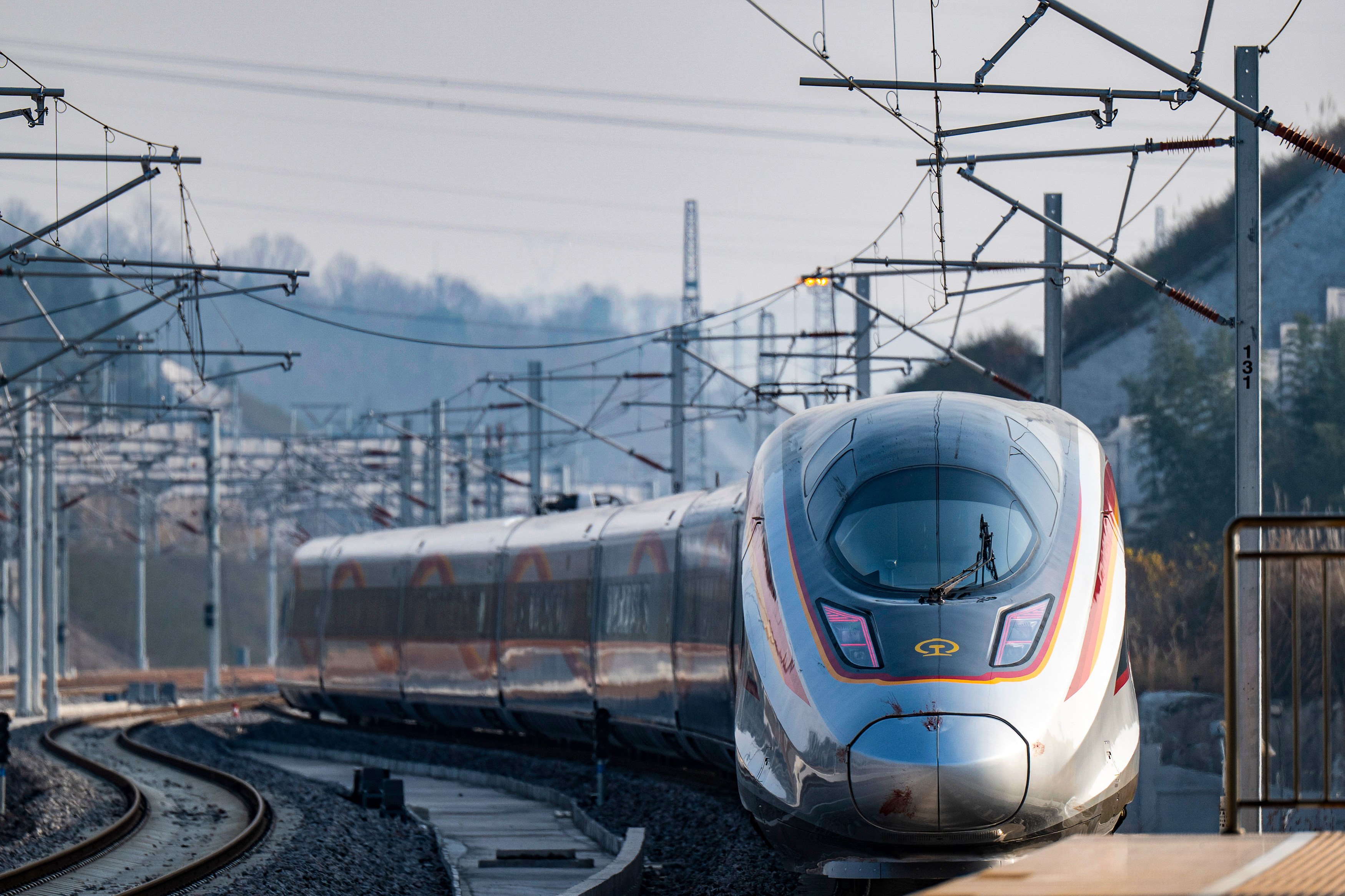 A high-speed train leaves the Yichang North Railway Station in China’s Hubei province on December 26. Photo: Xinhua