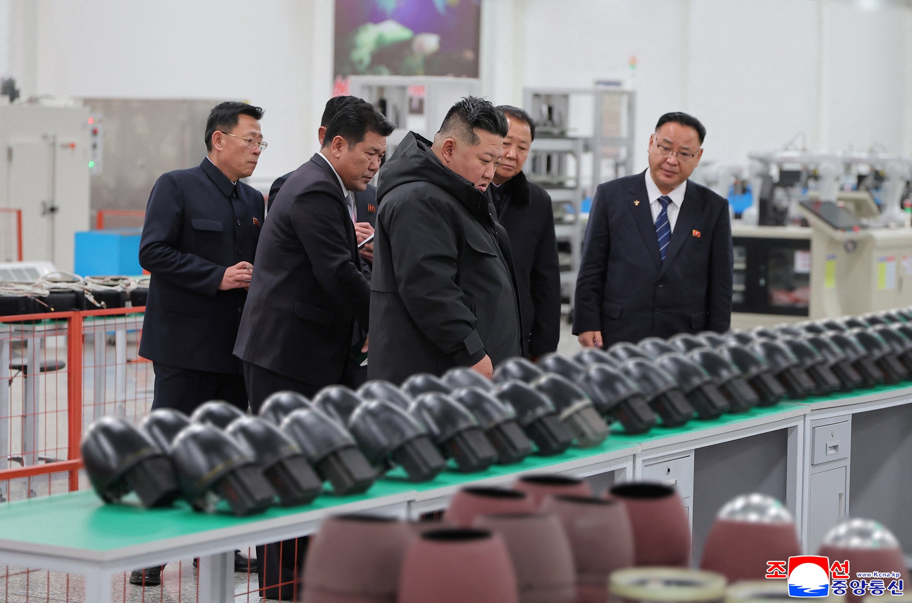 North Korean leader Kim Jong-un visits a military factory and inspects the production status of tactical guided weapons. Photo: KCNA via Reuters