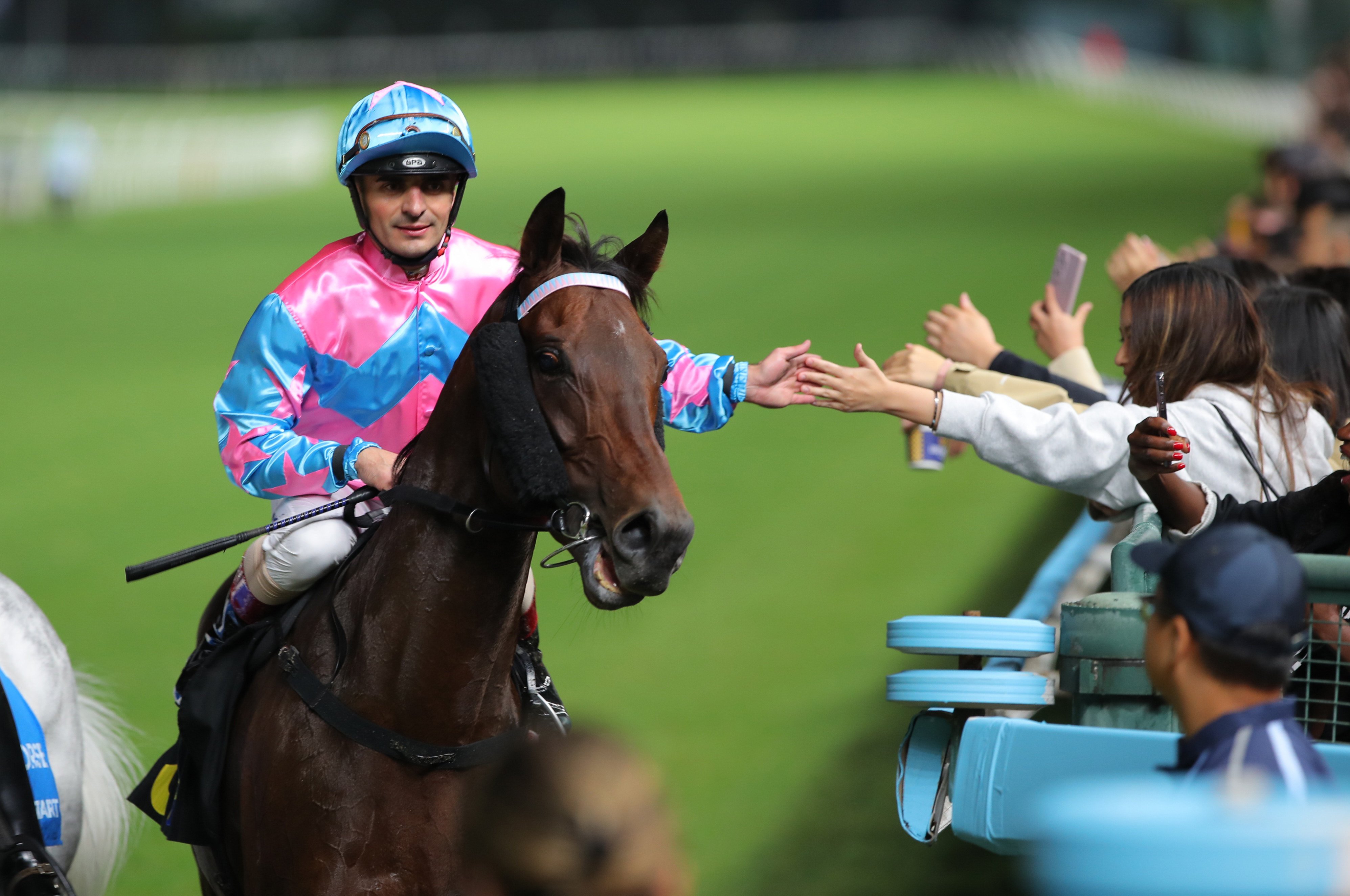 Andrea Atzeni celebrates a Happy Valley winner. Photos: Kenneth Chan
