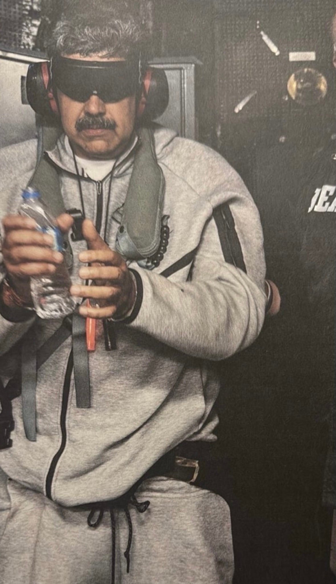 Venezuela’s Nicolas Maduro in US custody wearing a Nike tracksuit. Photo: White House via EPA