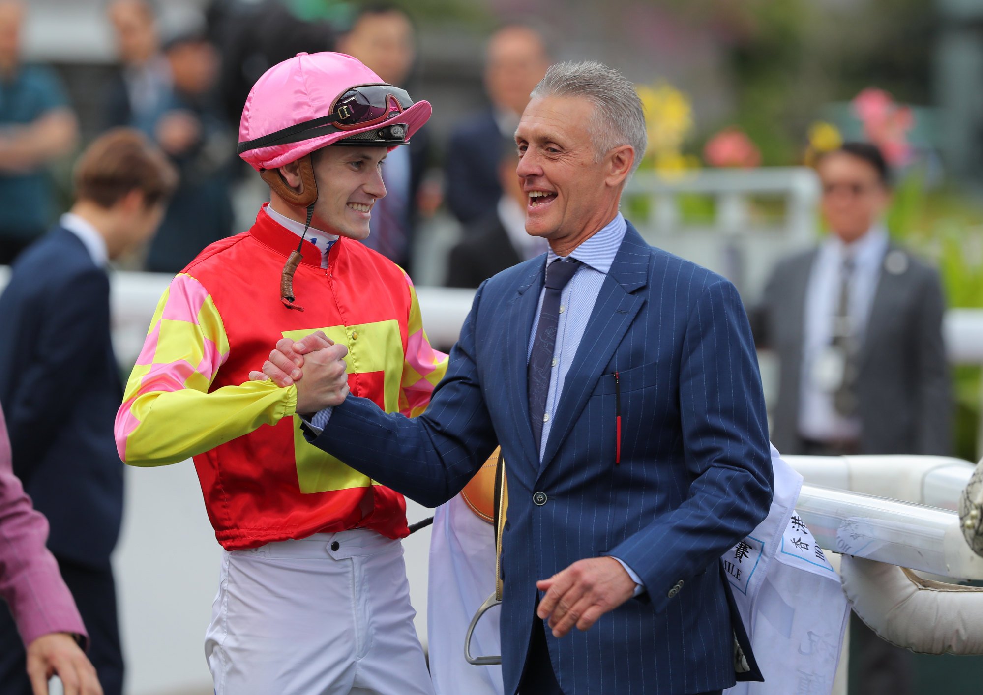 Luke Ferraris and Mark Newnham celebrate My Wish’s Hong Kong Classic Mile success. Luke Ferraris and Mark Newnham celebrate My Wish’s Hong Kong Classic Mile success.