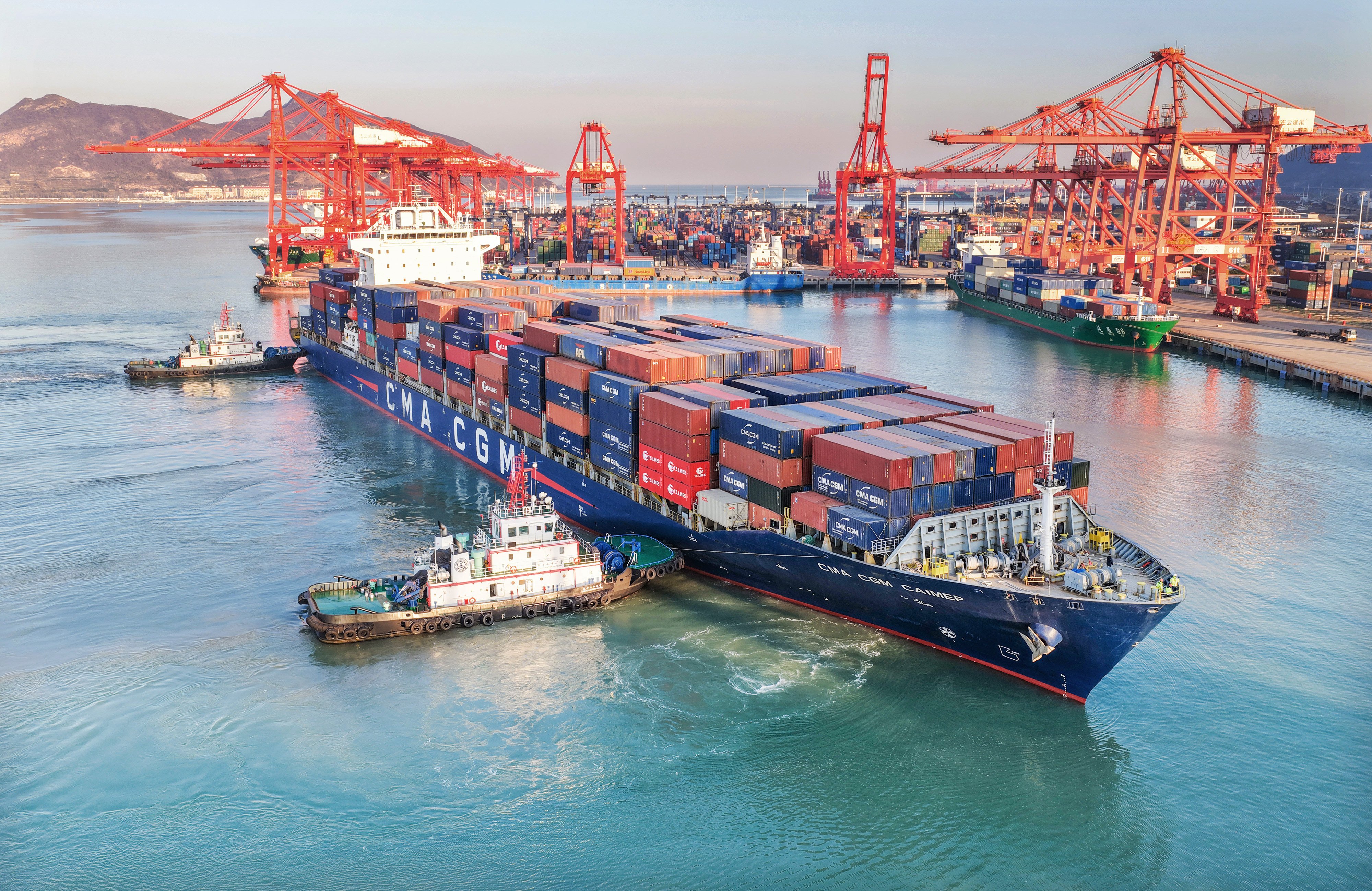 An aerial drone photo shows a cargo ship docking at Lianyungang Port, east China’s Jiangsu Province. China’s foreign trade in goods has sustained strong resilience with steady growth in the first 11 months of 2025 despite external headwinds, according to official data. Photo: Xinhua