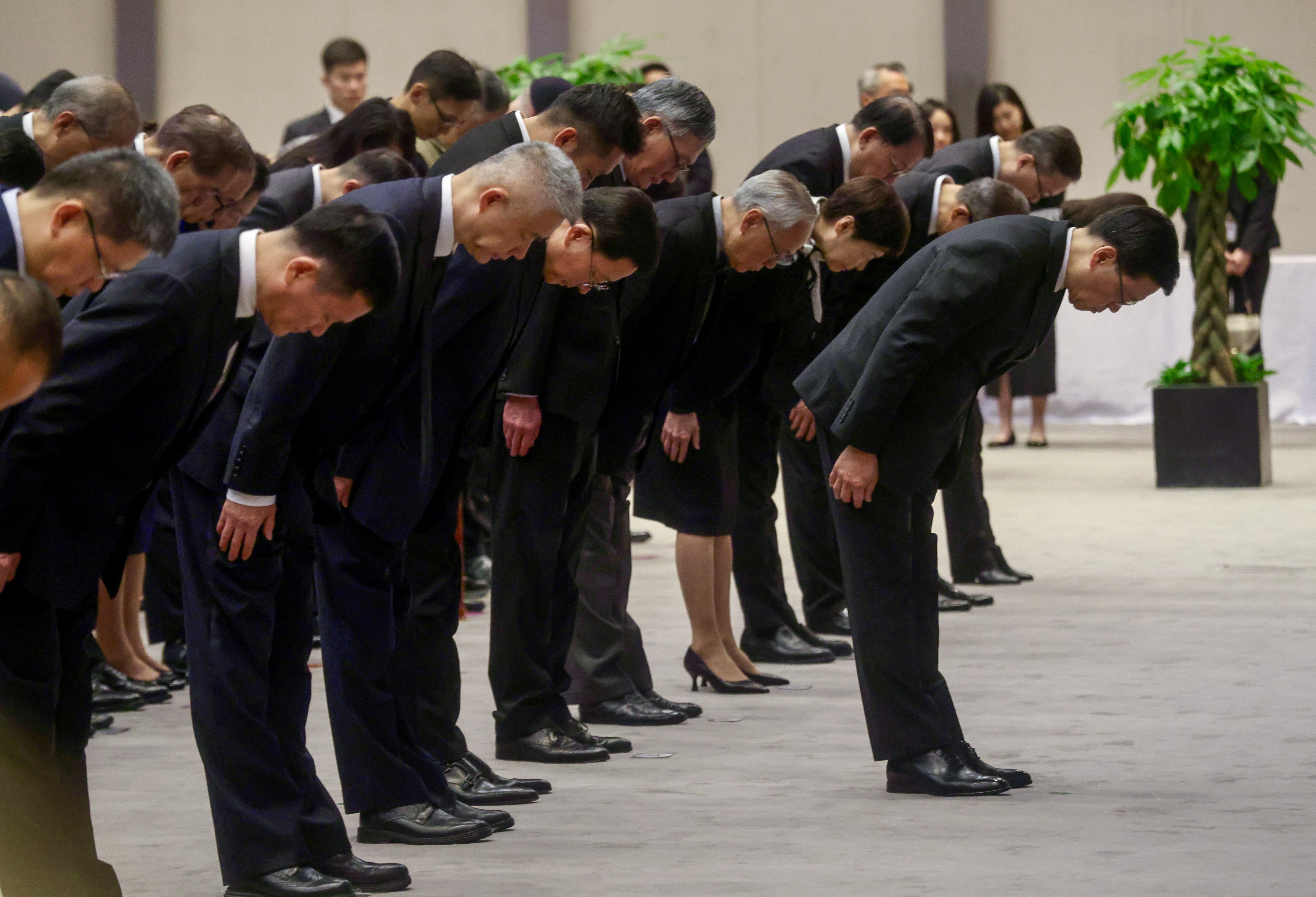 Chief Executive John Lee Ka-chiu and government officials at the ceremony of the Nanking massacre memorial held at the government’s headquarters on December 13. Photo: Jonathan Wong