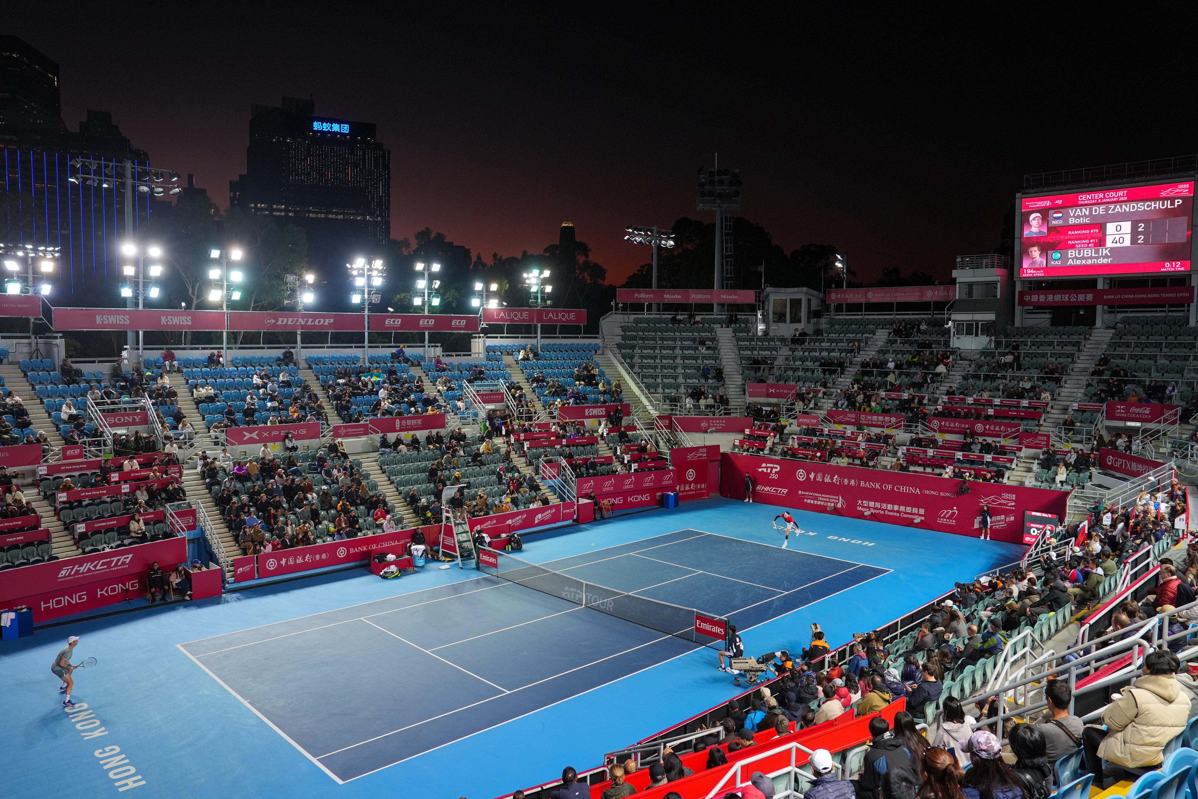 Alexander Bublik (right) serves during his men’s singles second round clash with  Botic van de Zandschulp at Victoria Park. Photo: Elson Li