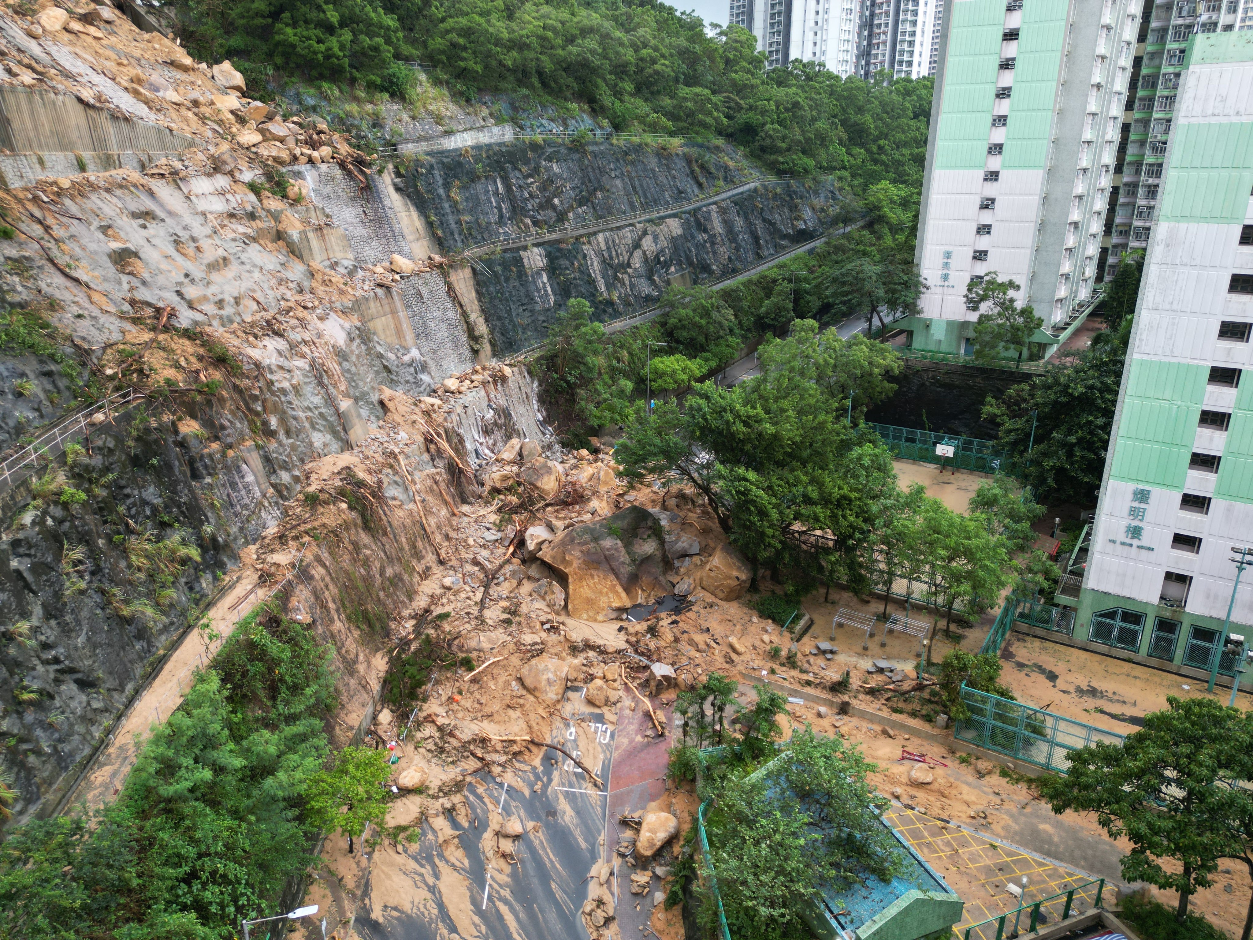 Debris collapses onto Yiu Hing Road at Shau Kei Wan in 2023. Photo: May Tse
