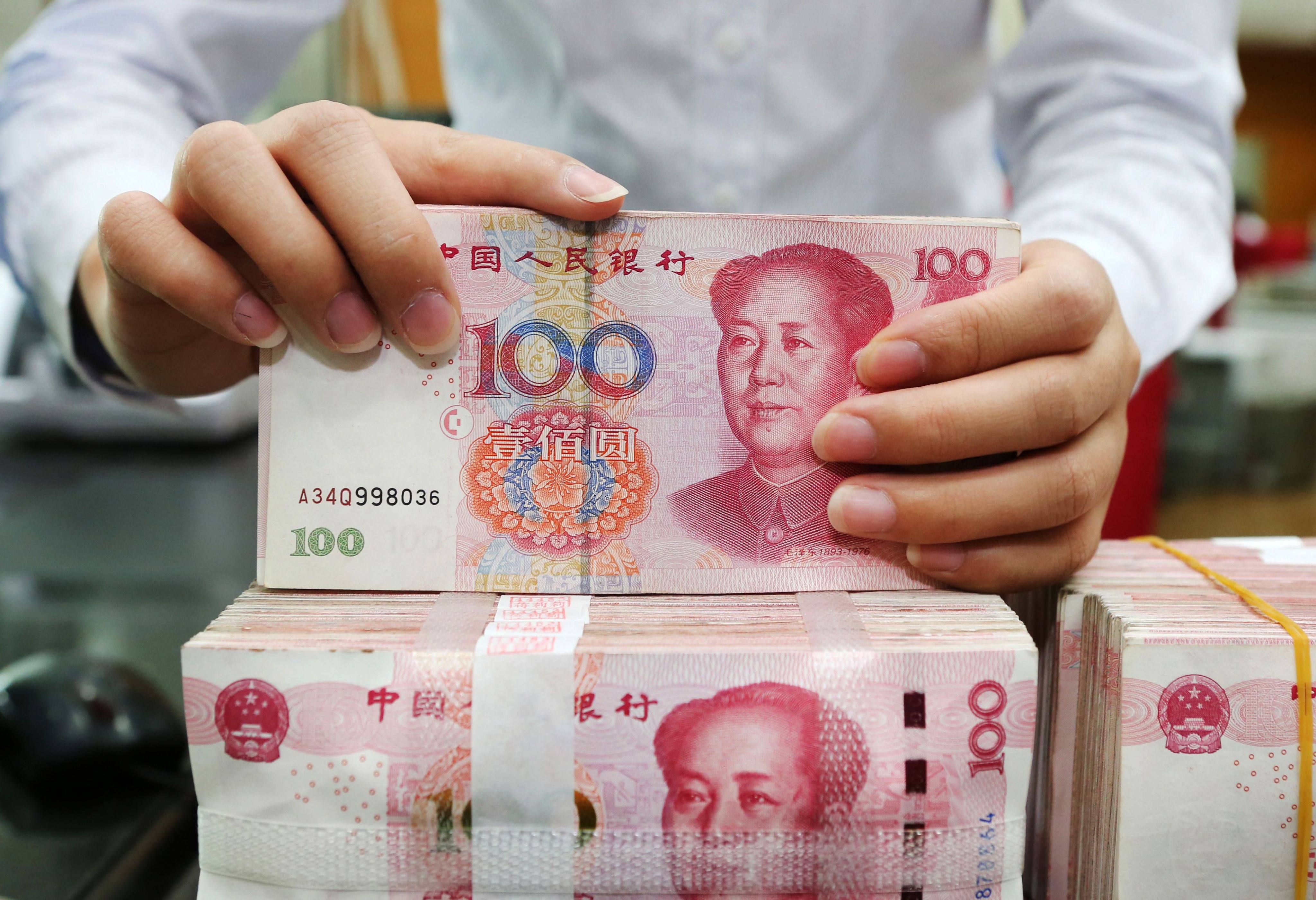 Chinese financial firms raised over US$10 billion last year to fund their overseas expansion. Photo: AFP