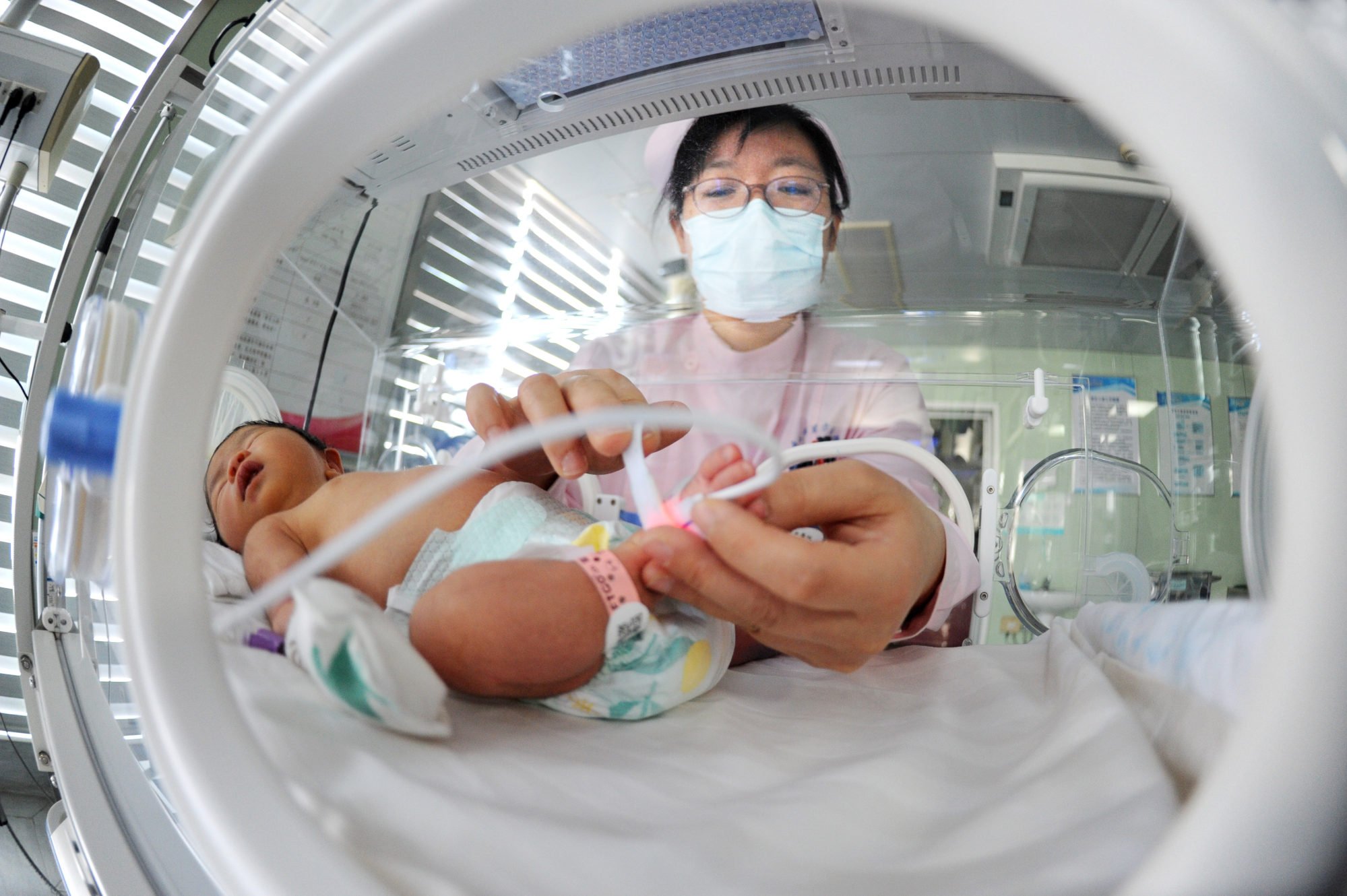 A baby being helped by a nurse in a maternity ward. Health chiefs have pledged to carry out a safety overhaul in the wake of the incident. Photo: Getty Images