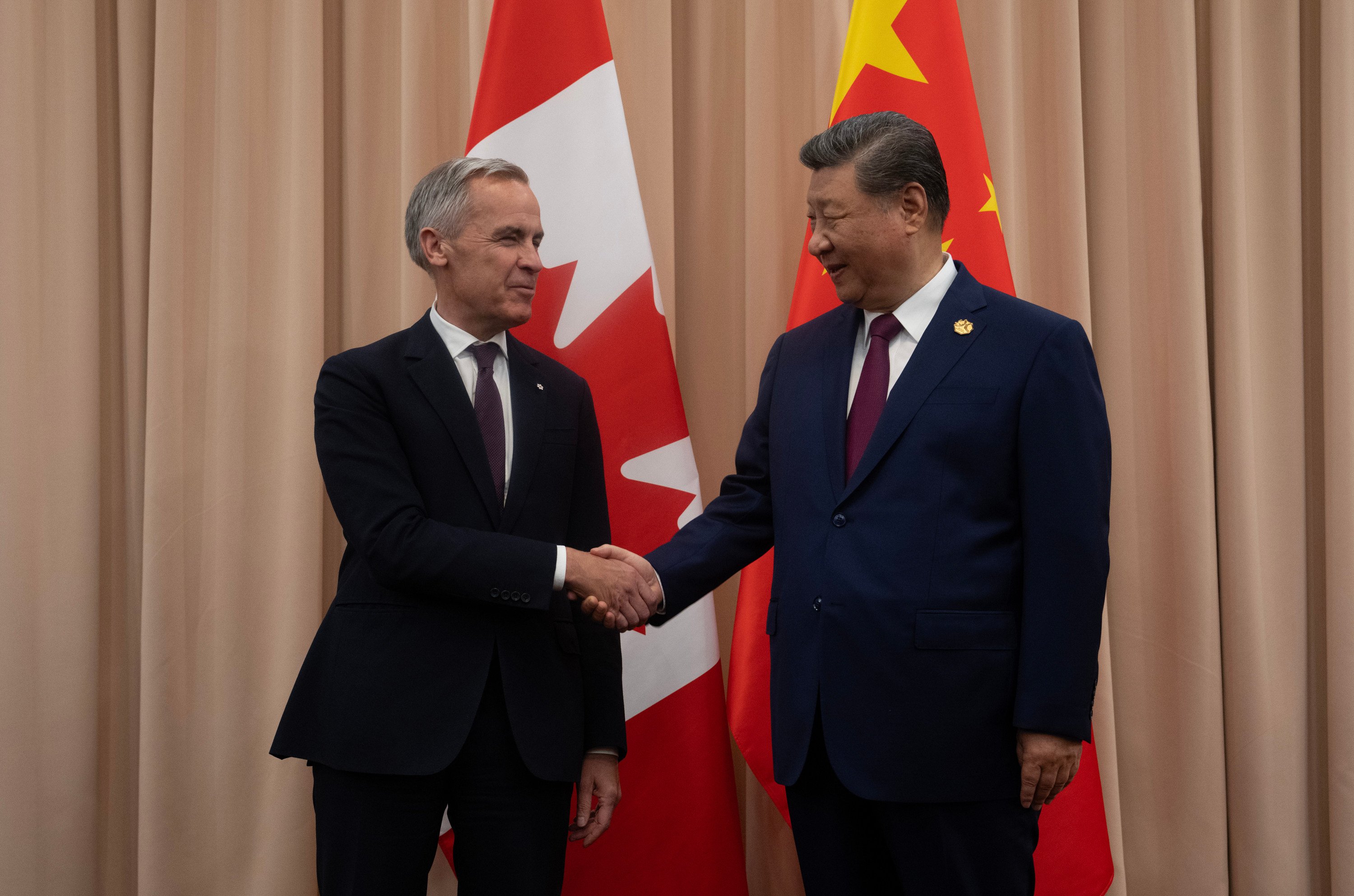Canadian Prime Minister Mark Carney shakes hands with Chinese President Xi Jinping at the start of a meeting in Gyeongju, South Korea, in October. Photo: The Canadian Press via AP