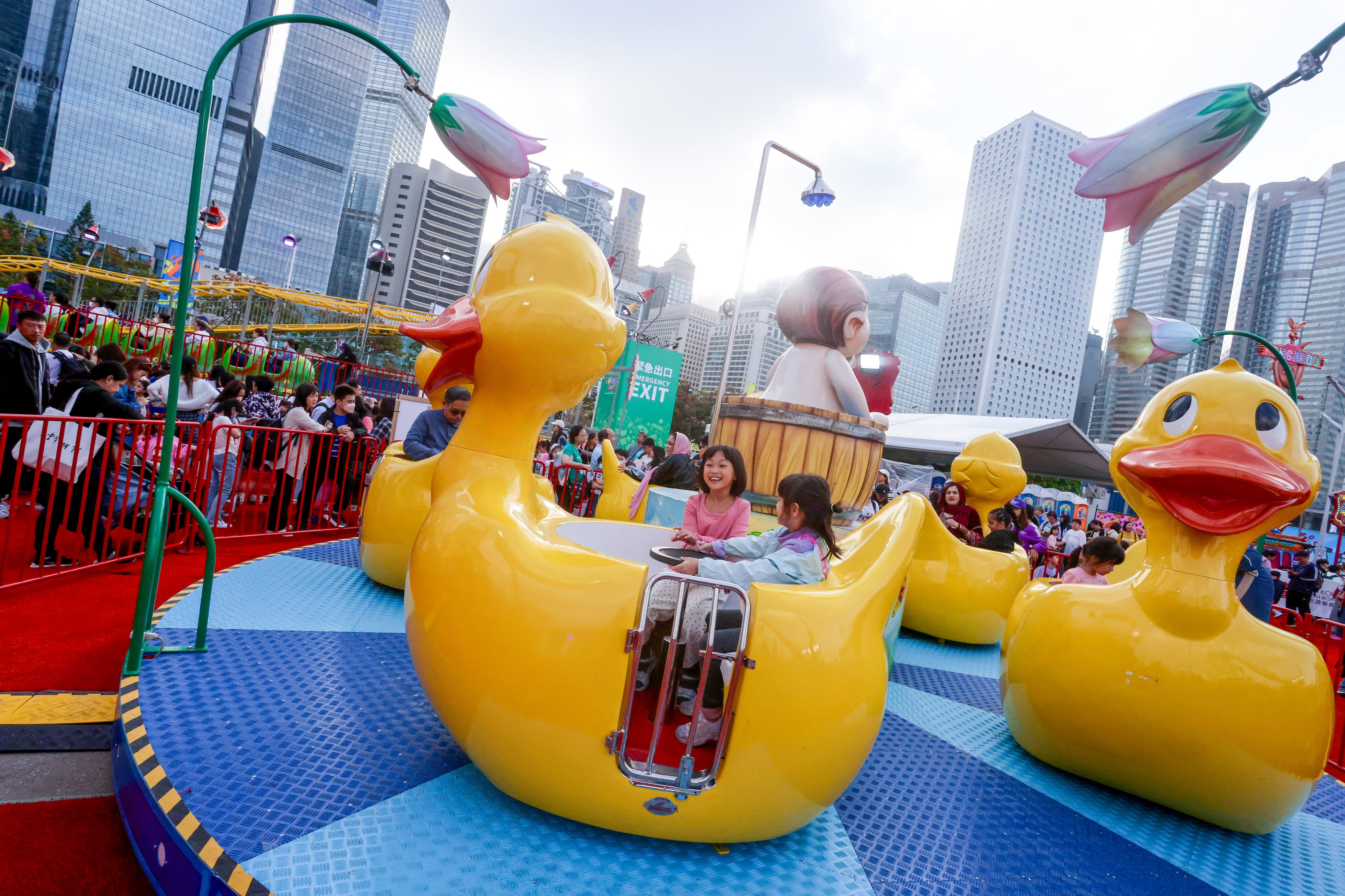 Children enjoy rides at the AIA Carnival at the Central Harbourfront on December 22, 2025. Photo: Jonathan Wong