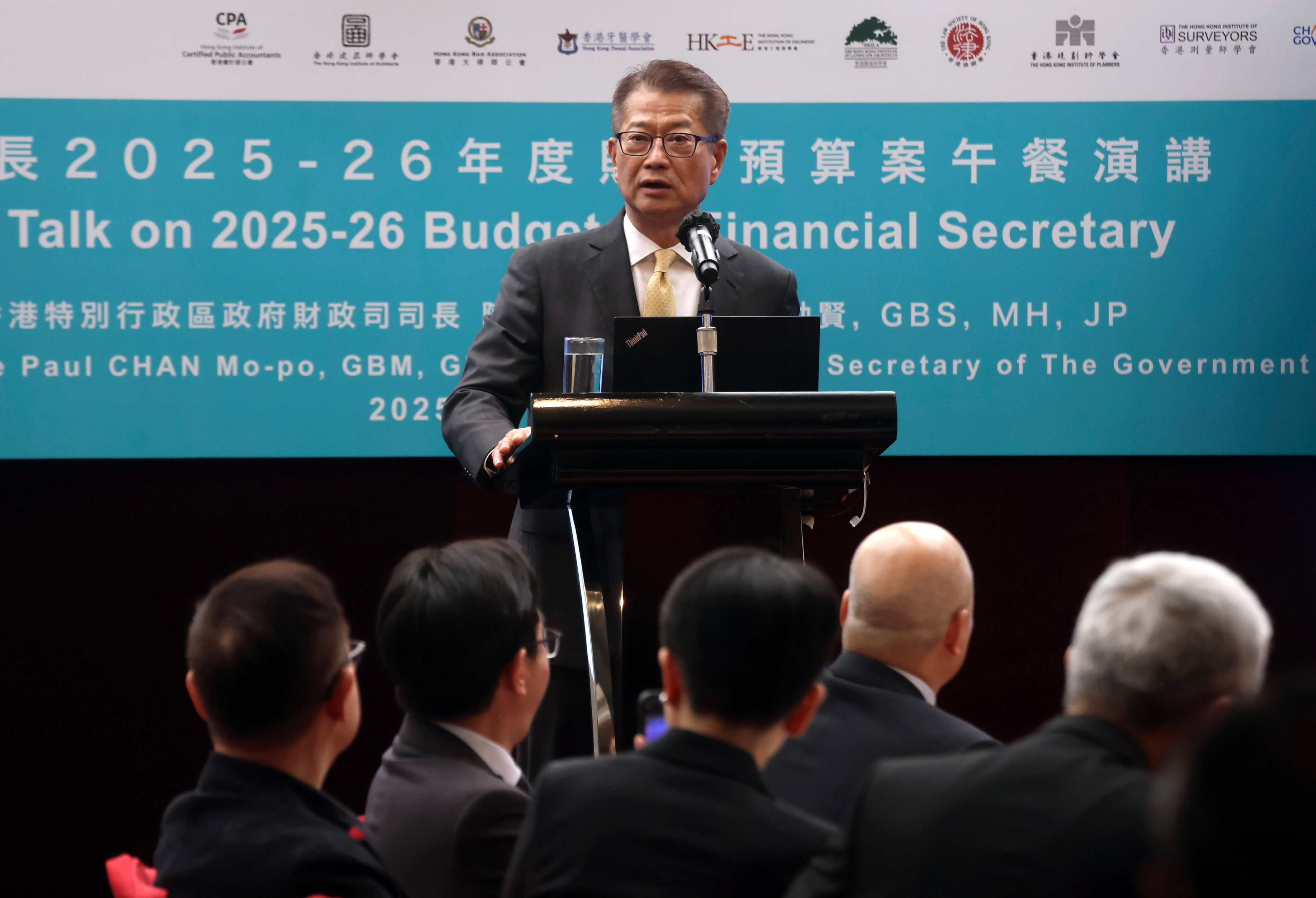 Financial Secretary Paul Chan Mo-po gives a speech at the Hong Kong Coalition of Professional Services luncheon at New World Harbour View in Wan Chai on March 11, 2025. Photo: Jonathan Wong