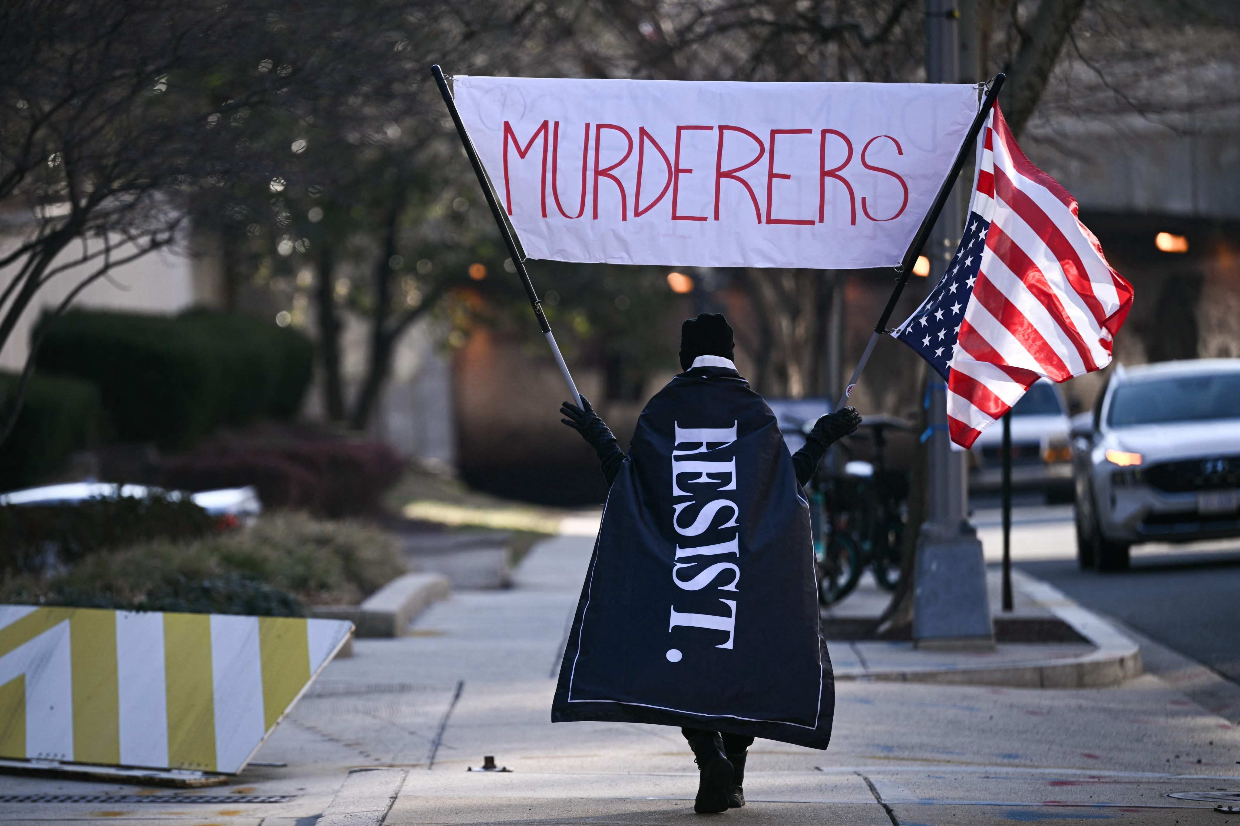 A demonstrator protests outside the US Immigration and Customs Enforcement building in Washington on Thursday. Photo: AFP