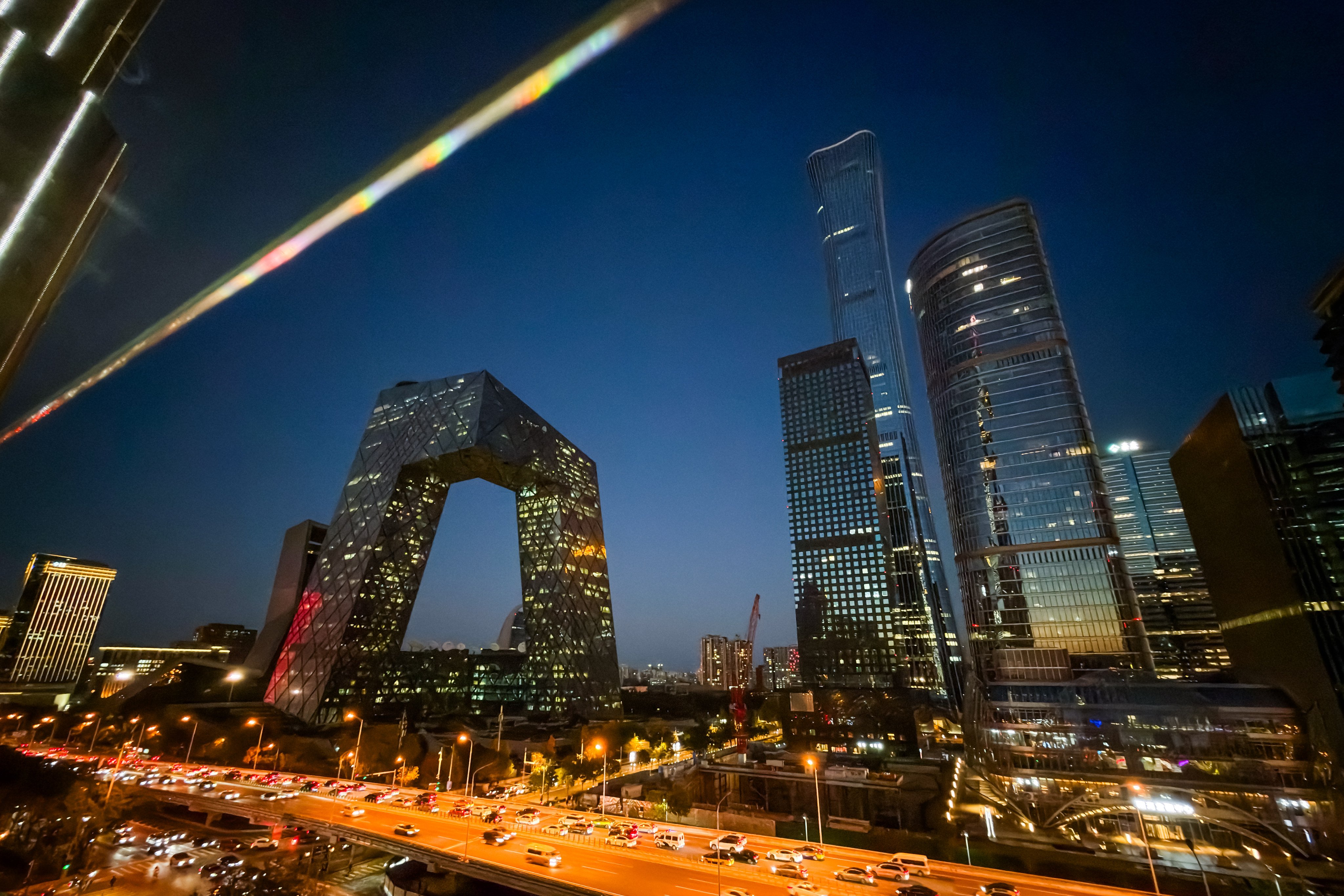 The illuminated CCTV headquarters and nearby skyscrapers are seen on November 9 in Beijing. China’s leadership is calling for stronger policy narratives and prompt responses to market concerns. Photo: Getty Images