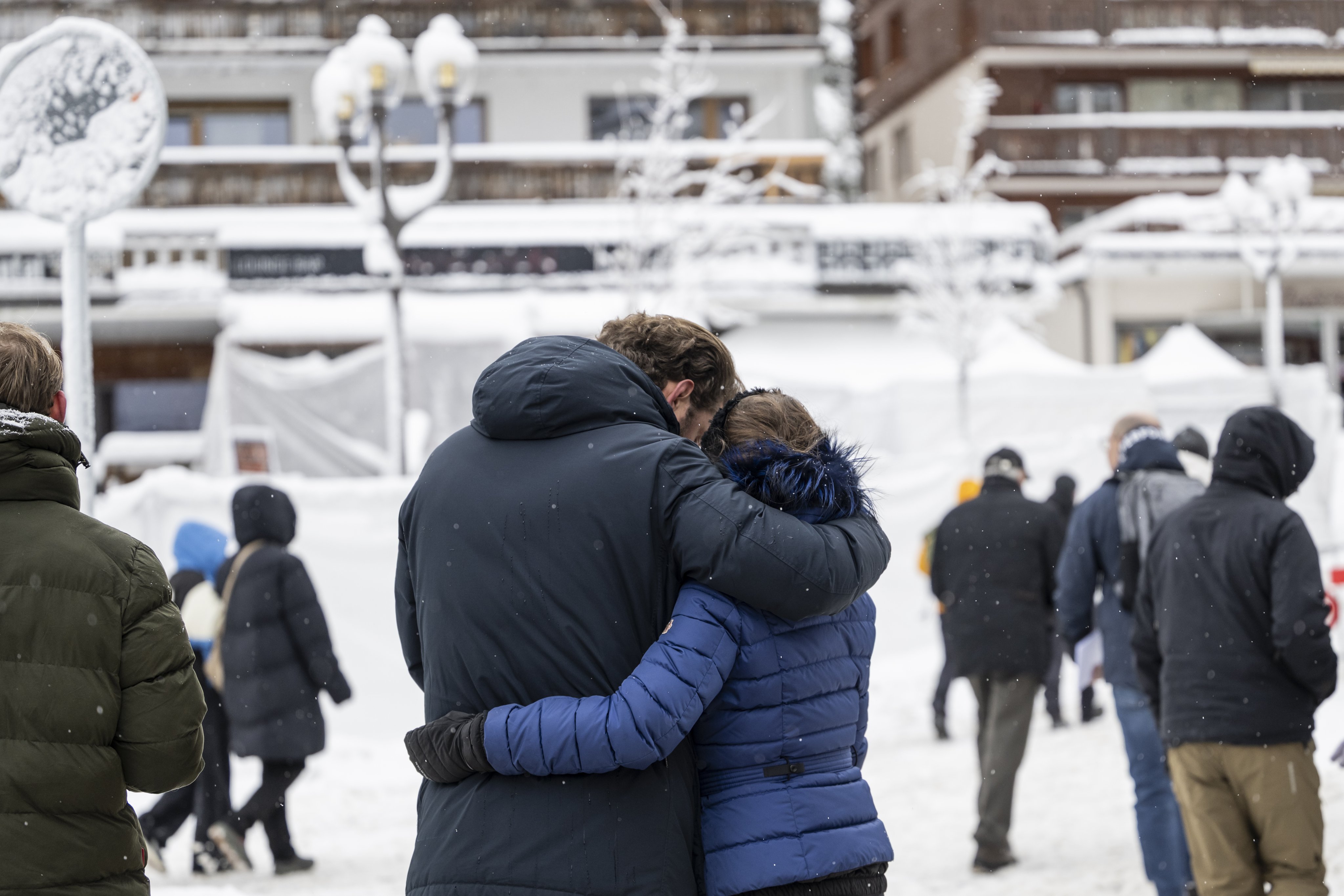 People gather in front of Le Constellation bar on Friday during the national day of mourning for the victims of the fire in Crans-Montana, Switzerland, Photo: EPA