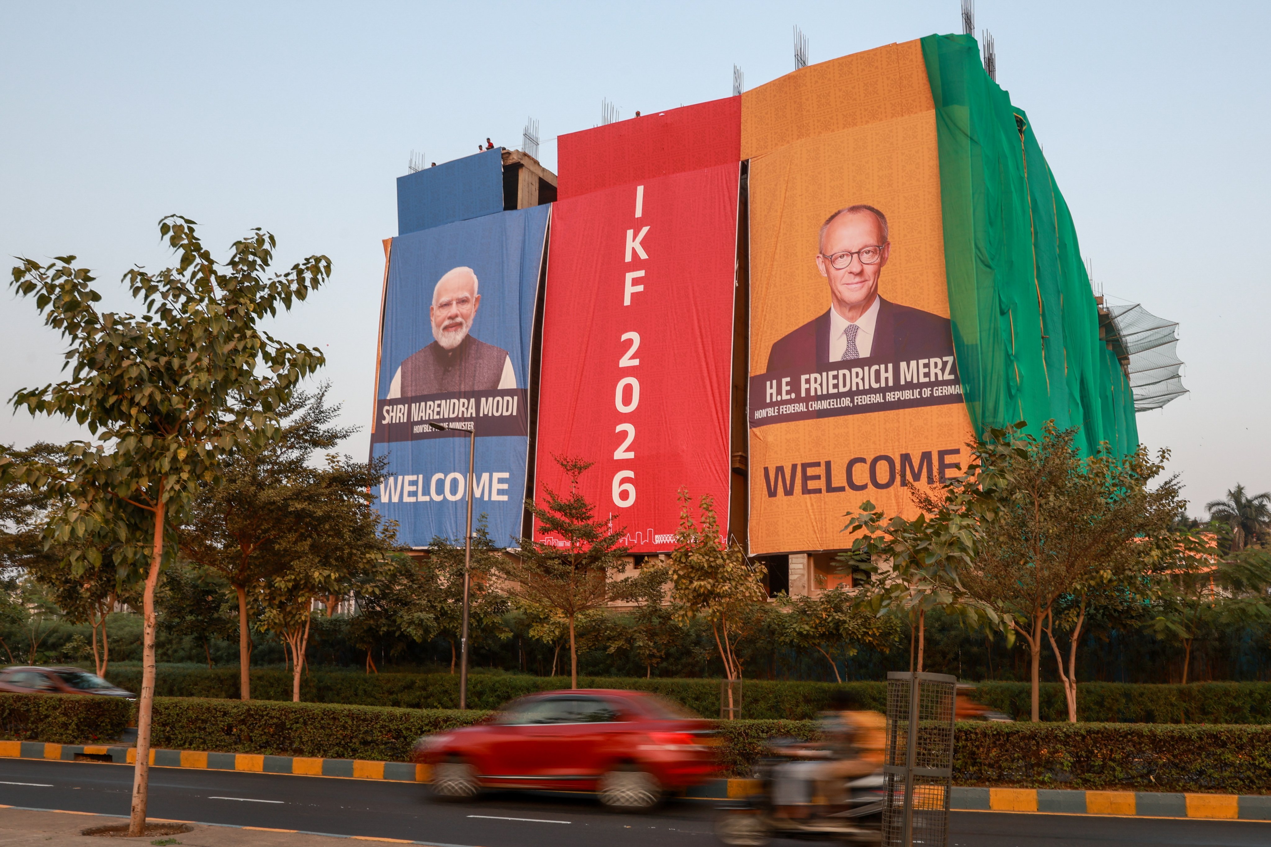 A poster featuring German Chancellor Friedrich Merz (right) and Indian Prime Minister Narendra Modi, in Ahmedabad, India, on Sunday. Photo: EPA-EFE